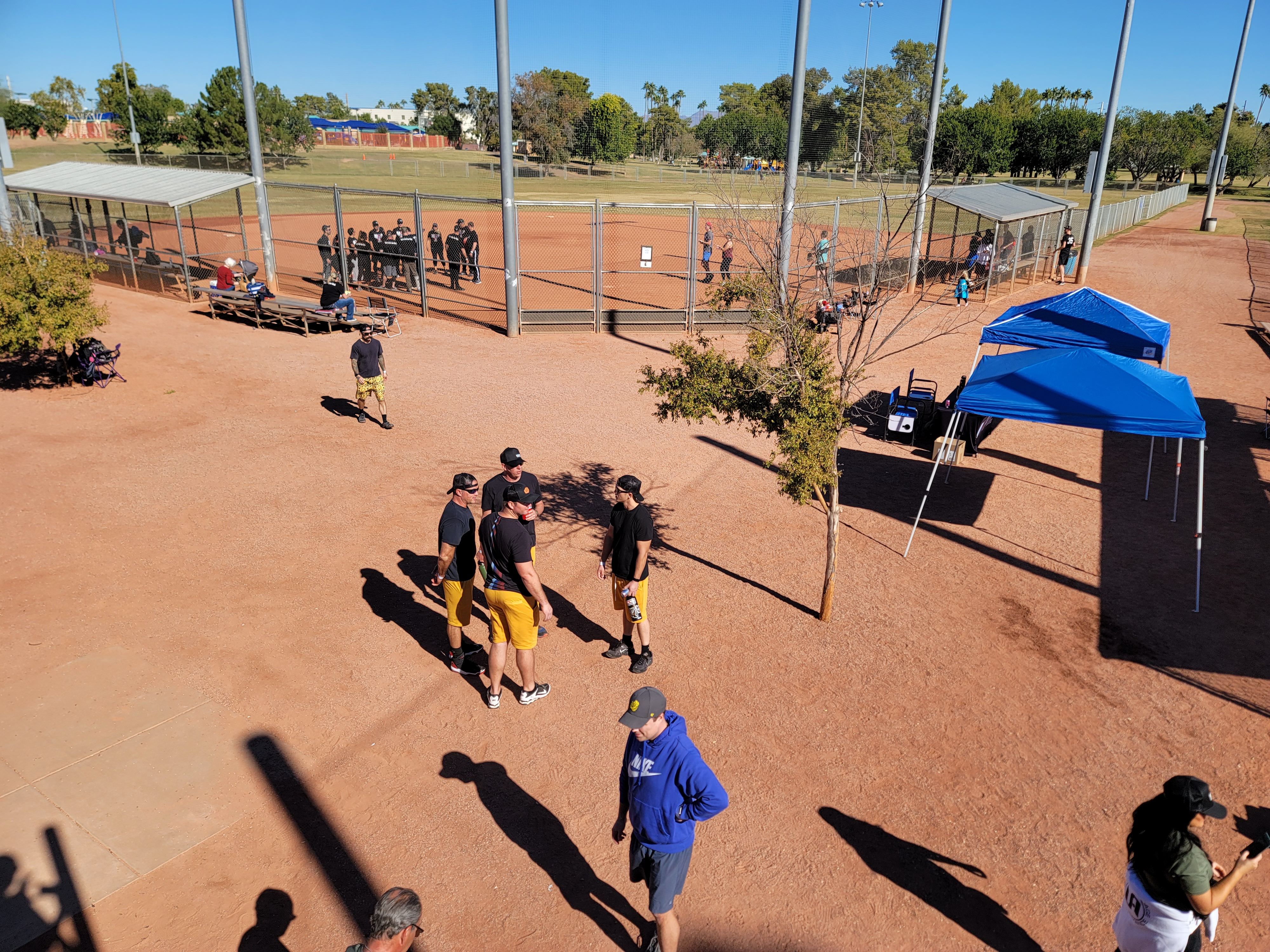 Overview of kickball tournament fields and teams gathering at Chaparral Park