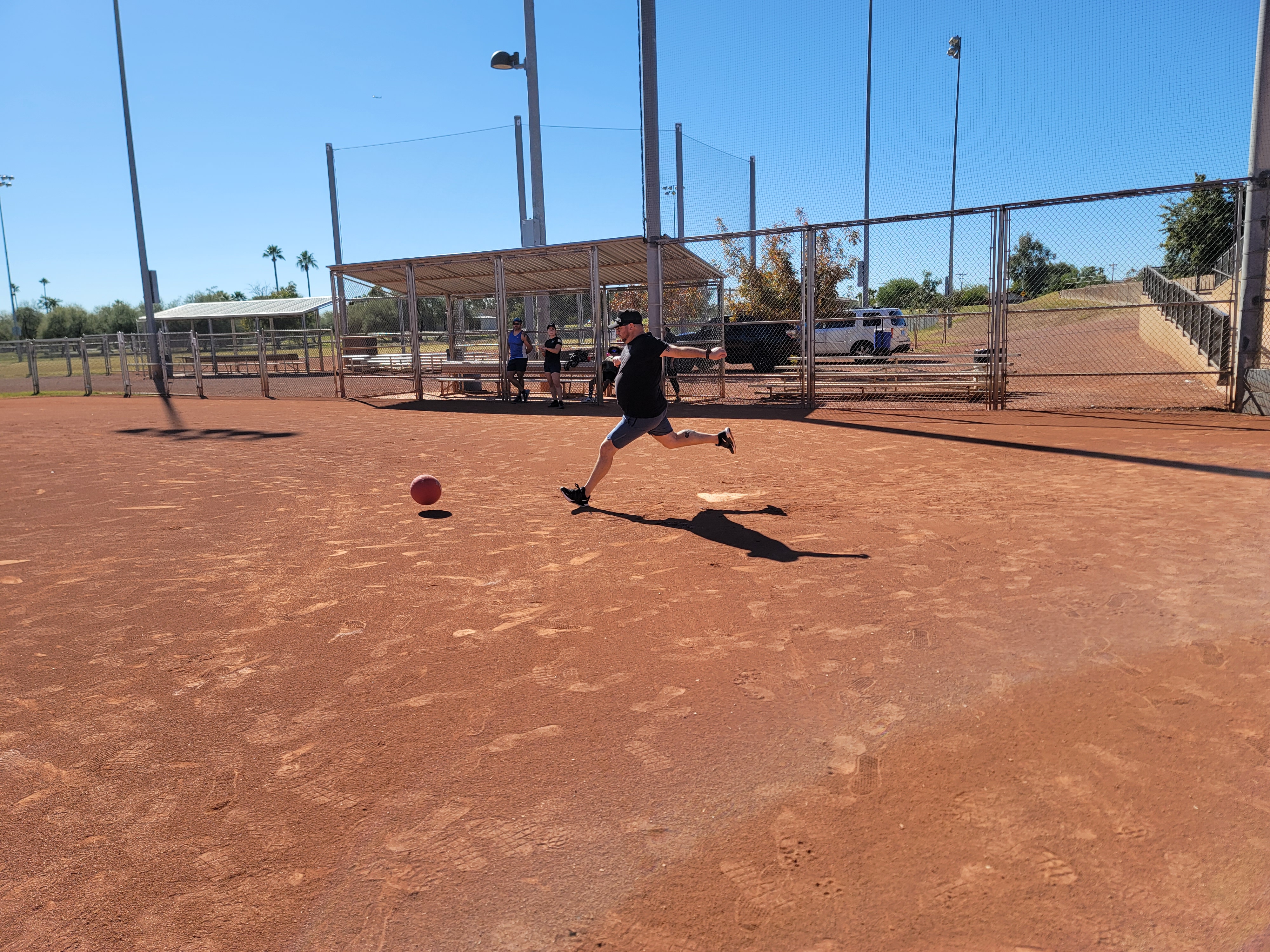 Stars & Strikes kickball player kicking the ball at Chaparral Park