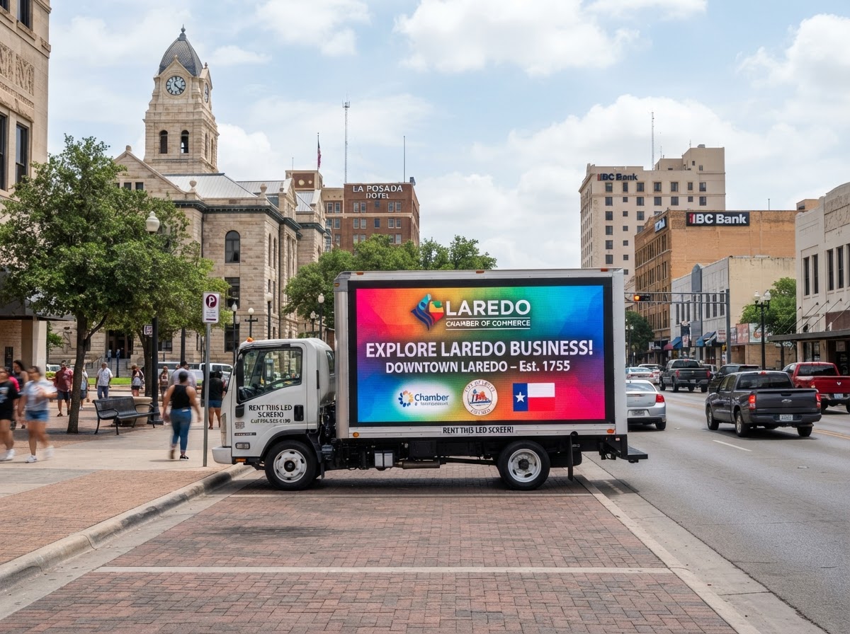 Motivo mobile billboard truck on a Downtown Laredo business district route during the day