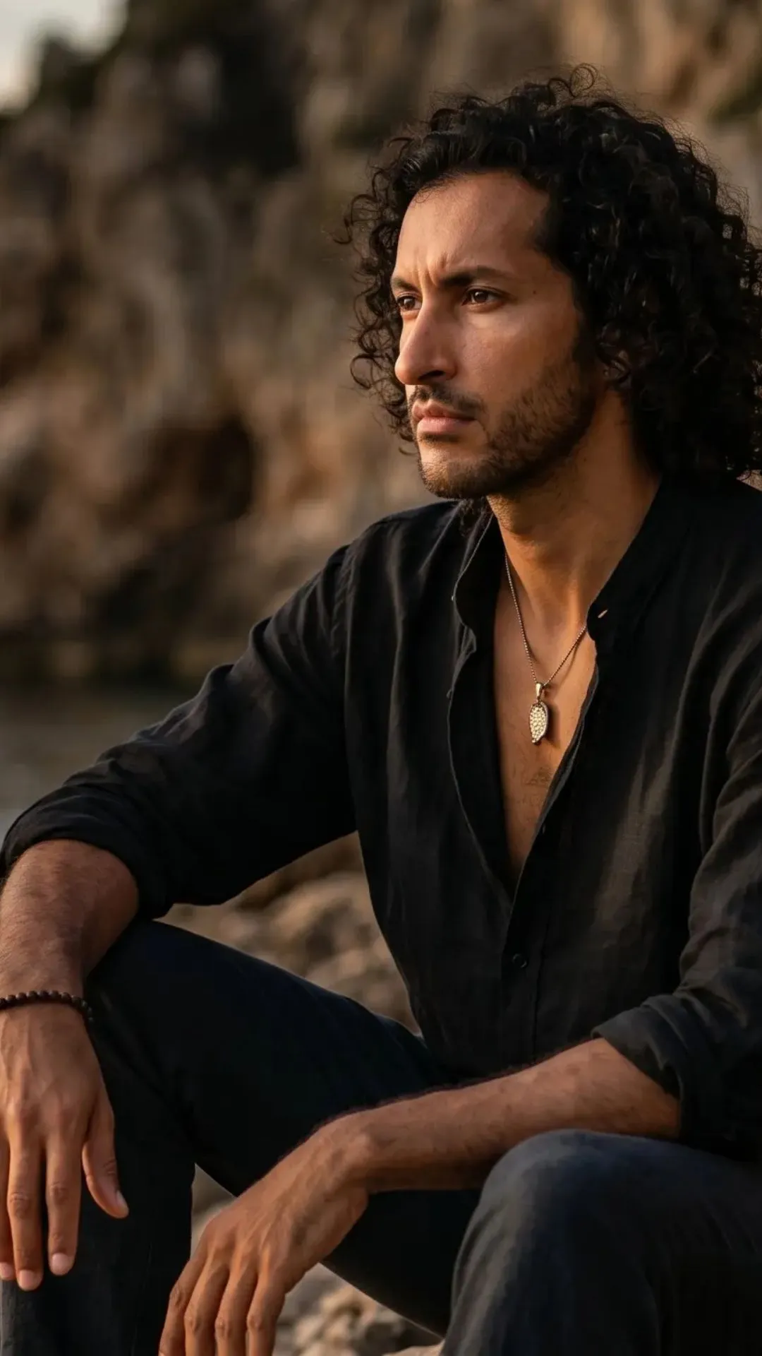 Man sitting by the sea