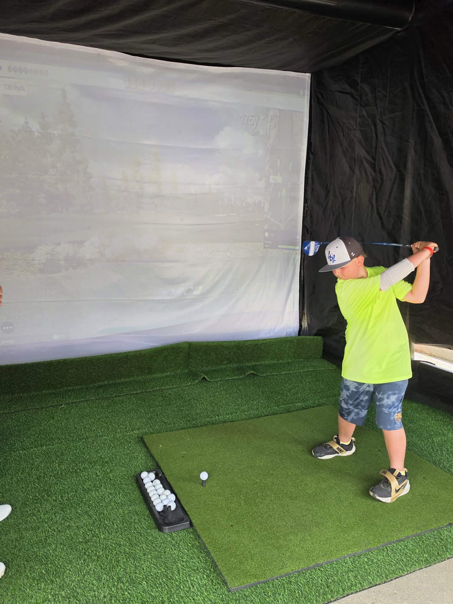 Kid playing golf