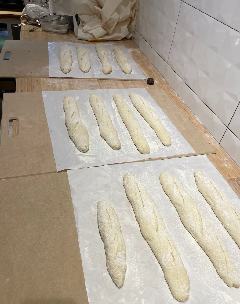 Hand shaping artisanal bread dough in Richmond Hill