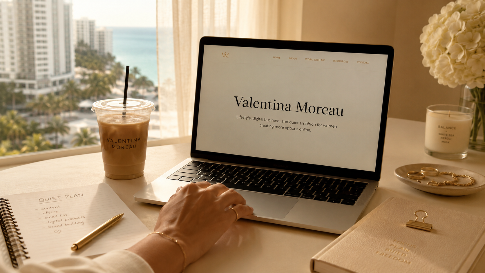 Warm minimal desk with coffee and laptop
