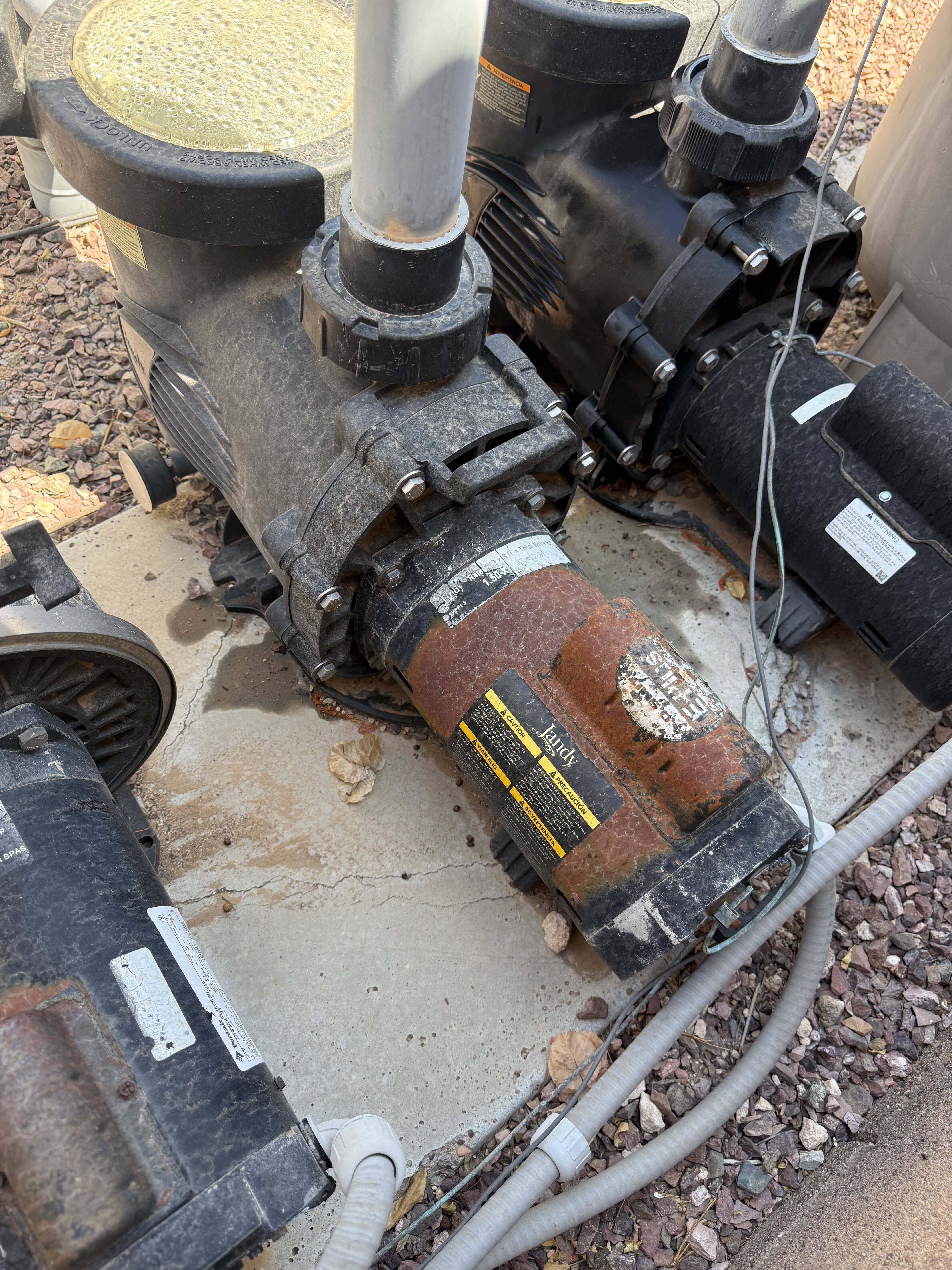 Old rusted pool pump motor before replacement