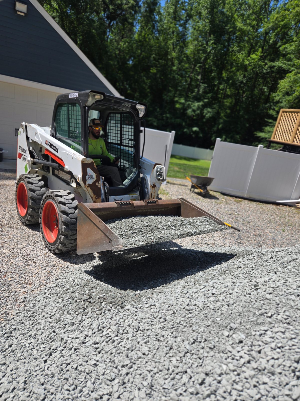 Driveway gravel with the skid steer