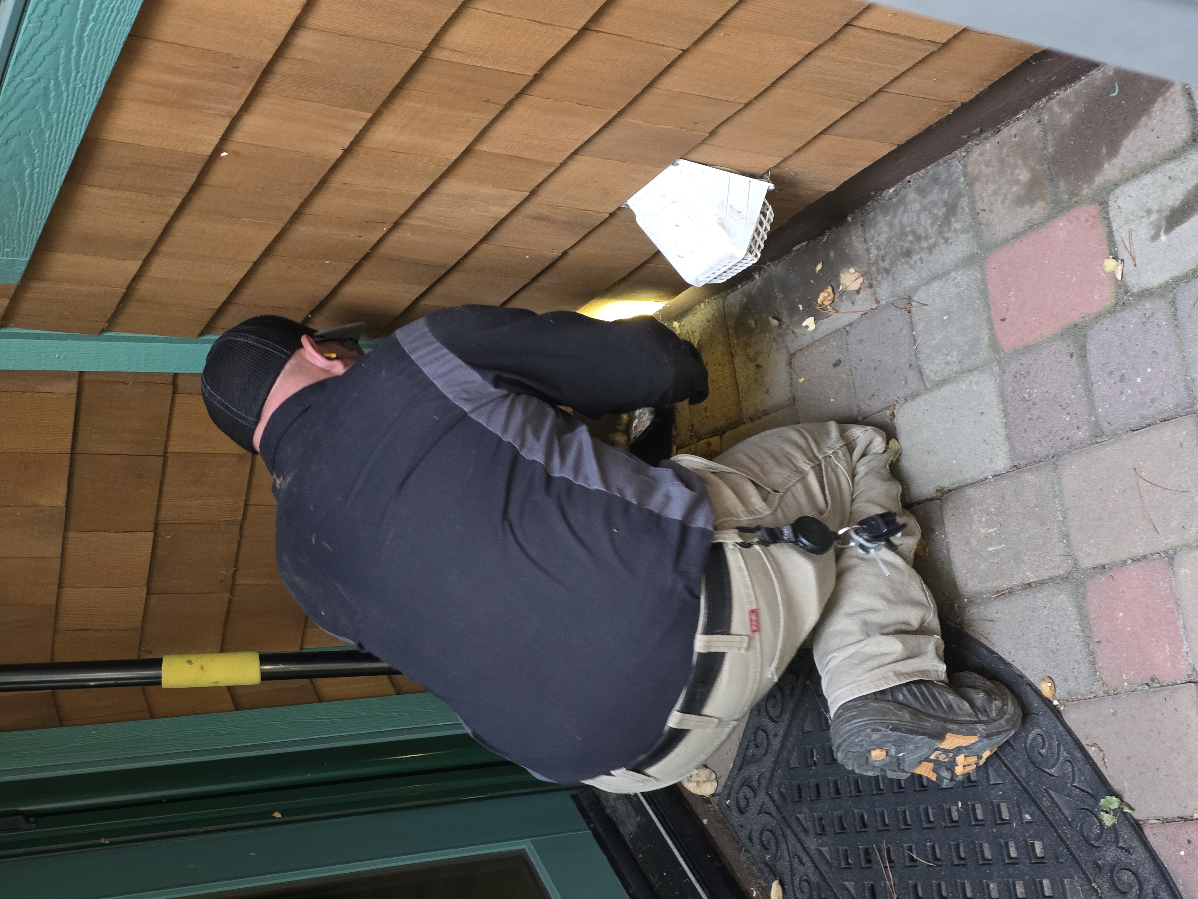 Technician performing exclusion work