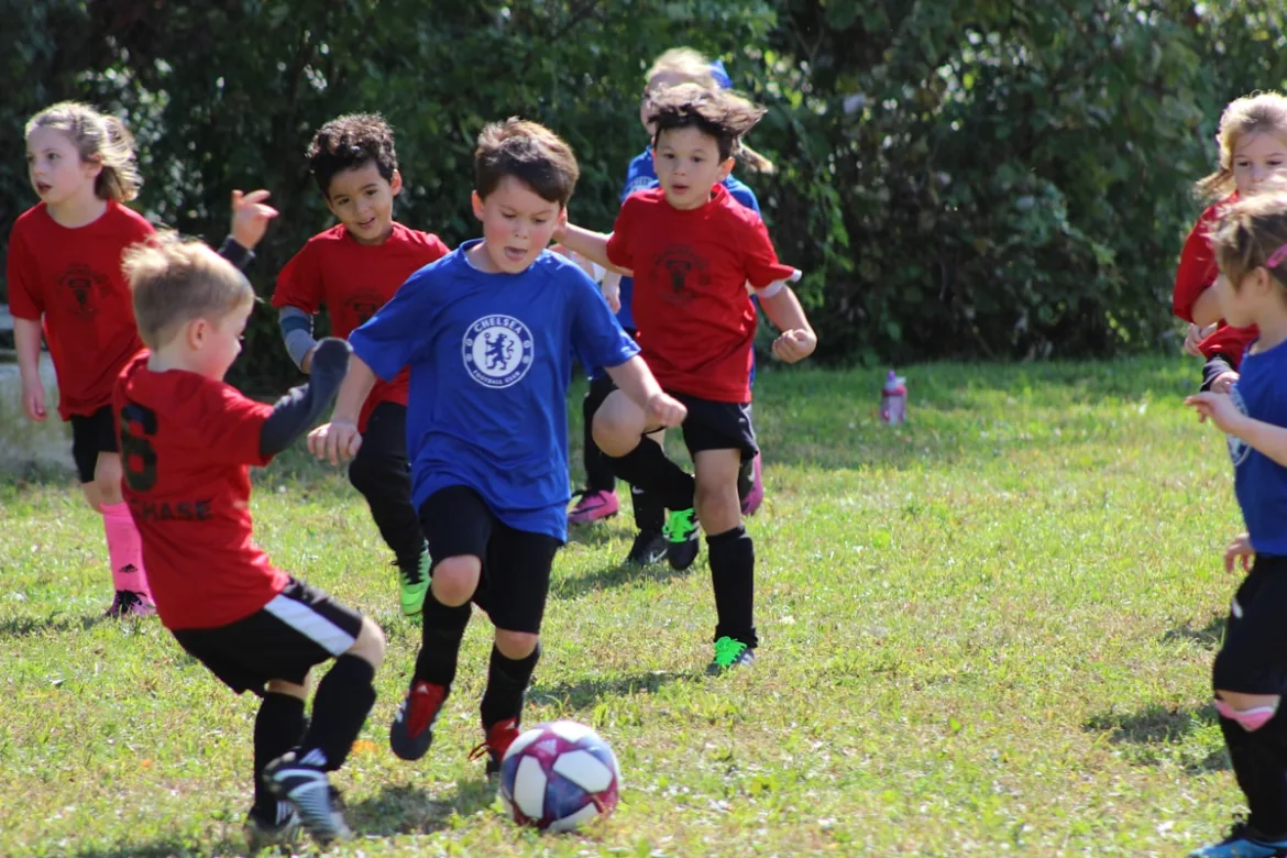 Kids playing sports outdoors