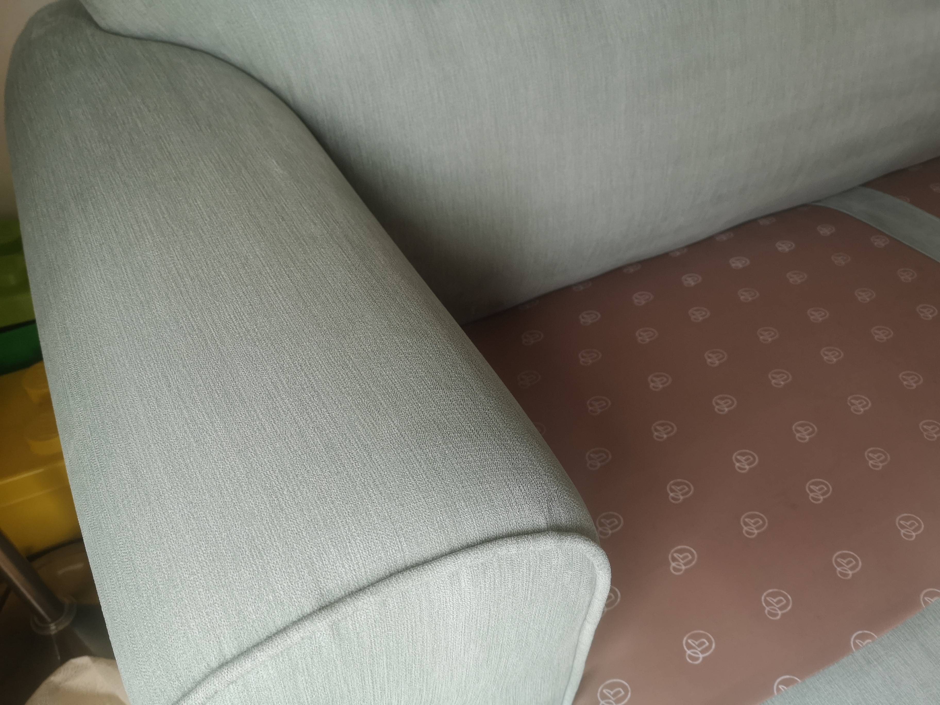Grey fabric sofa after professional cleaning - immaculate condition