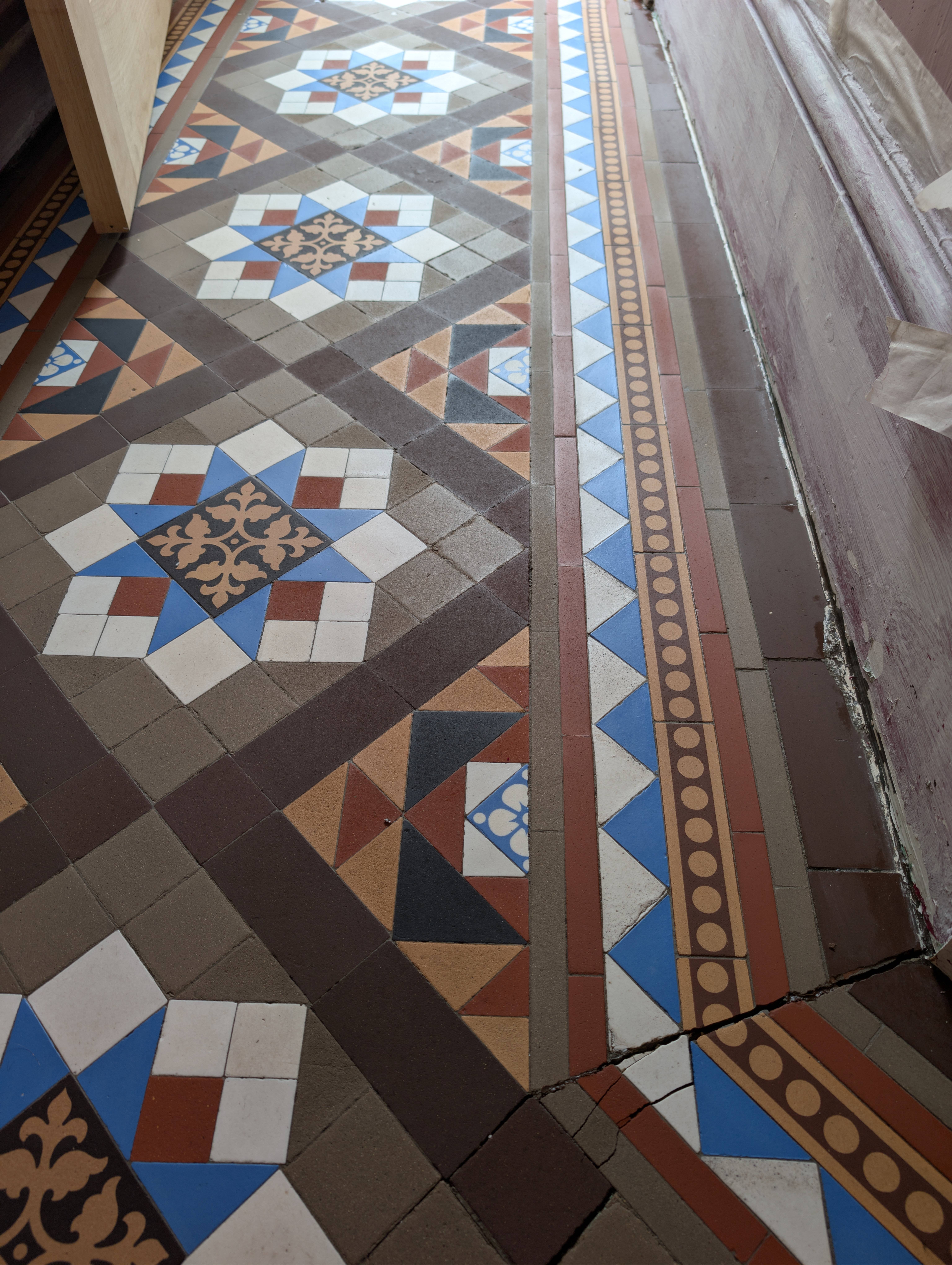 Victorian tiled floor after professional restoration - bright and vibrant