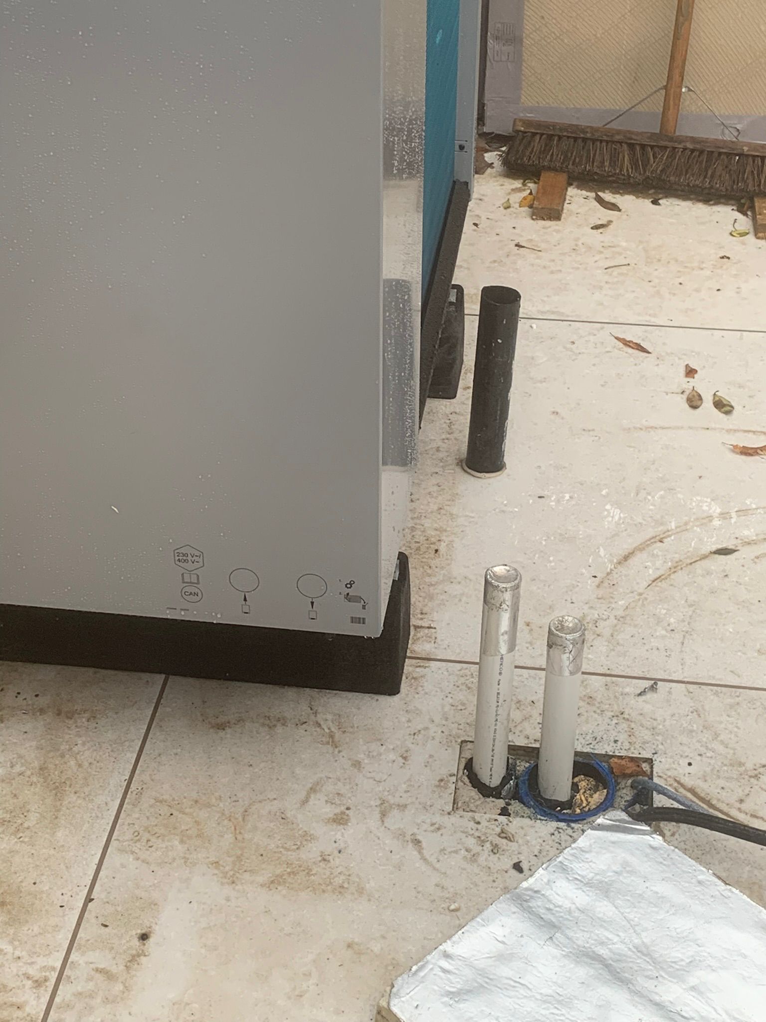 Heat pump outdoor unit close-up pipework