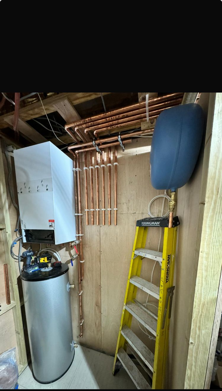 Indoor cylinder and boiler setup with copper pipework