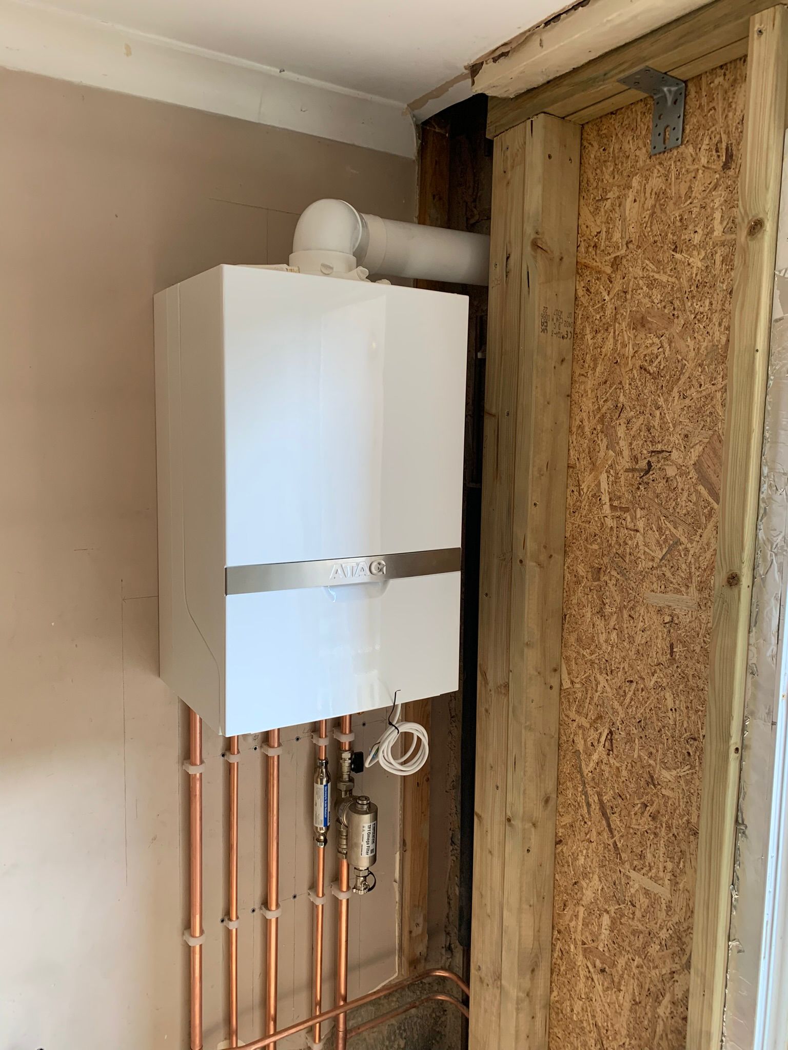 Wall-mounted ATAC boiler installation