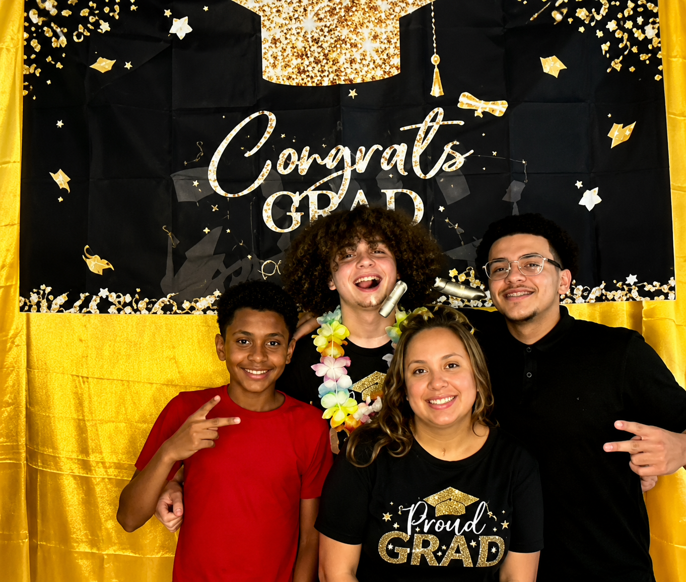 Second group photo with four people at Ricky's Graduation Party