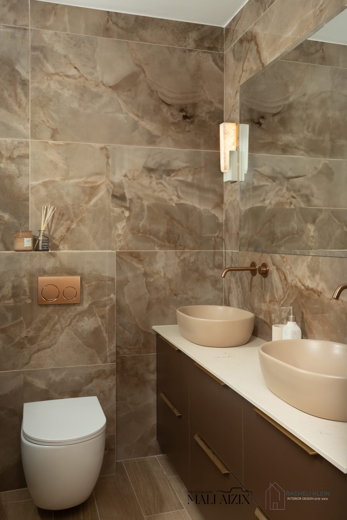 Custom bathroom design in Israel with brown marble and double sink by Racheli Klein