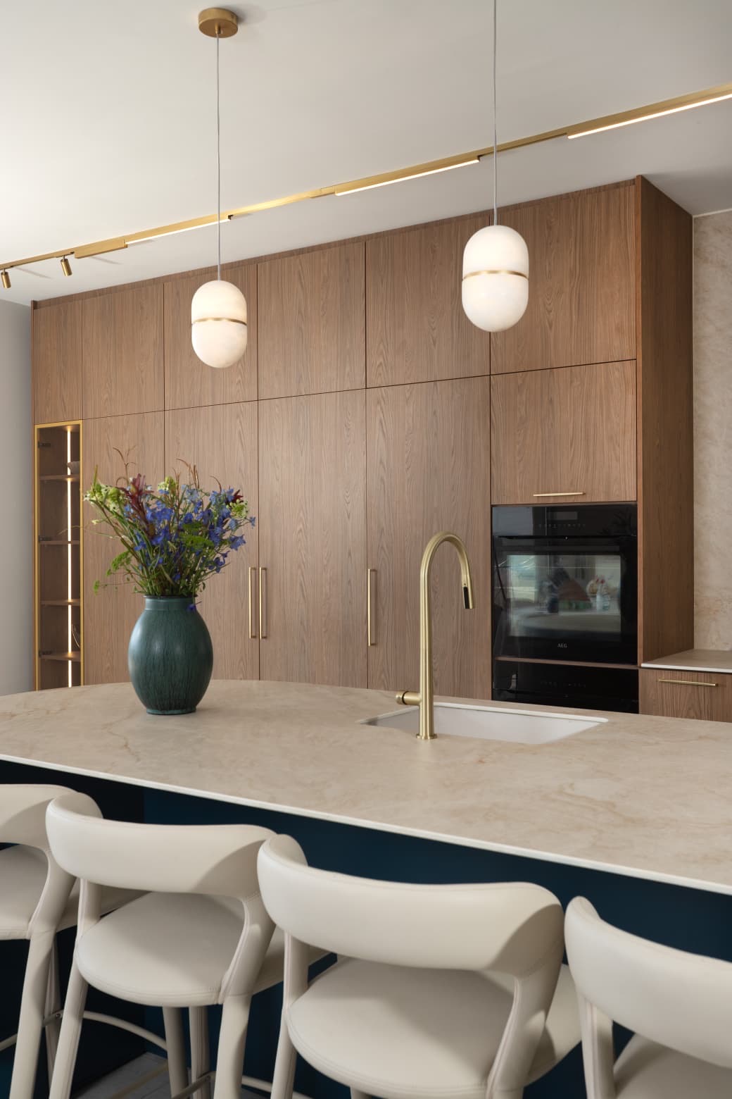 Kitchen island with blue base and vase