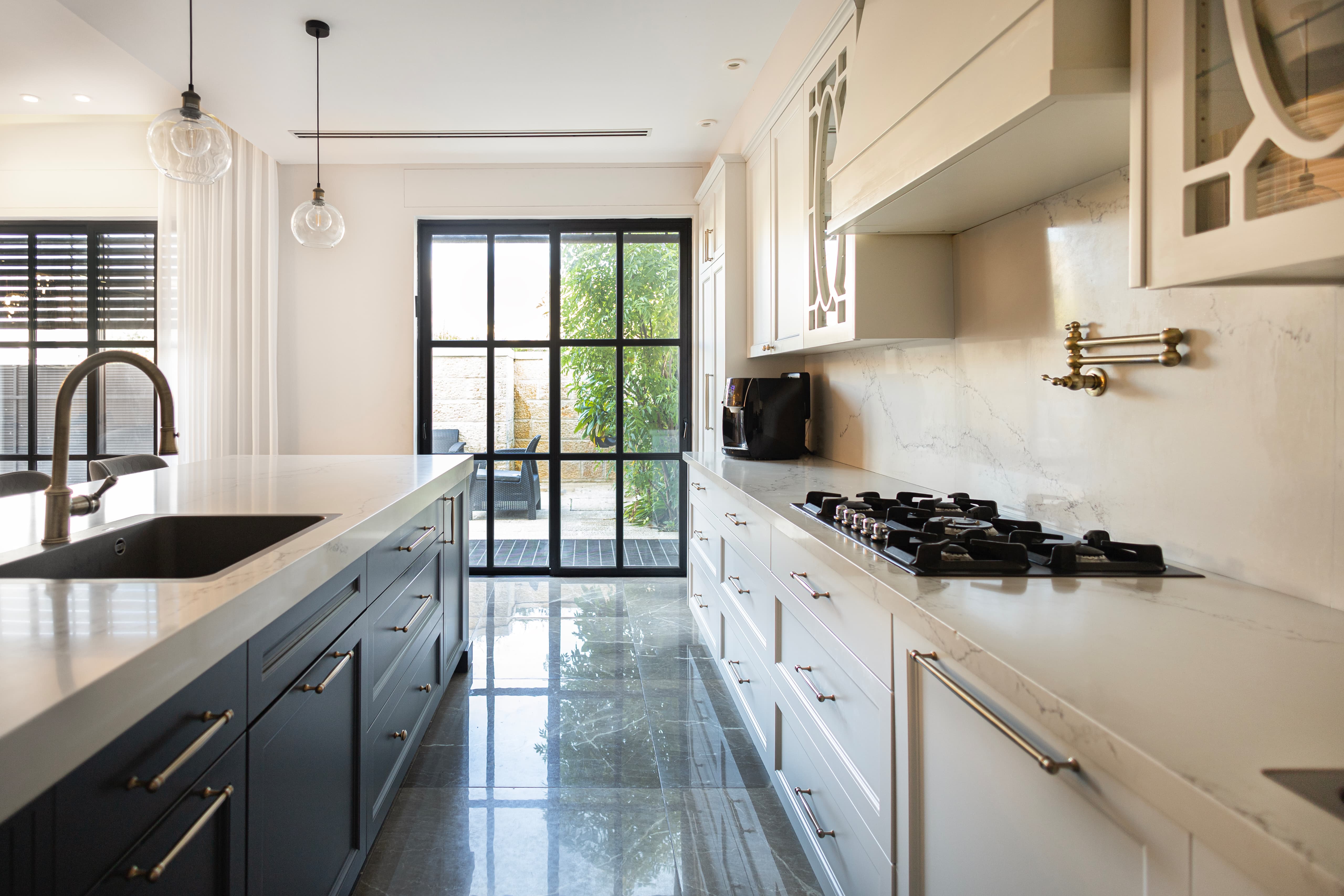 Kitchen with island and glass door