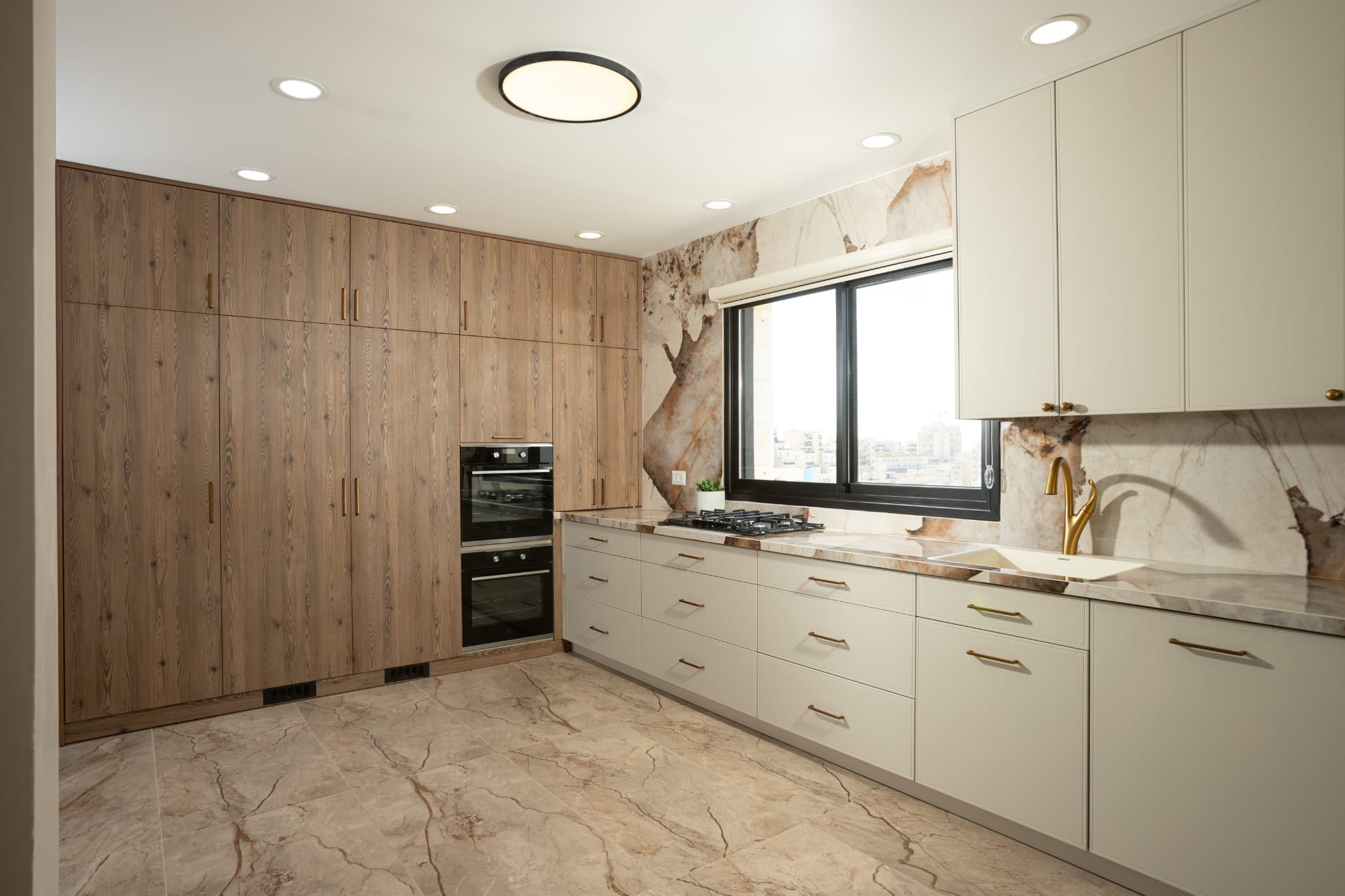 Modern kitchen with brown cabinets and marble backsplash