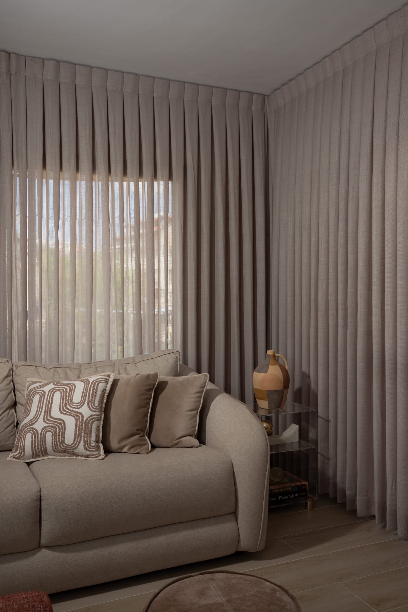Living room with elegant curtains and couch