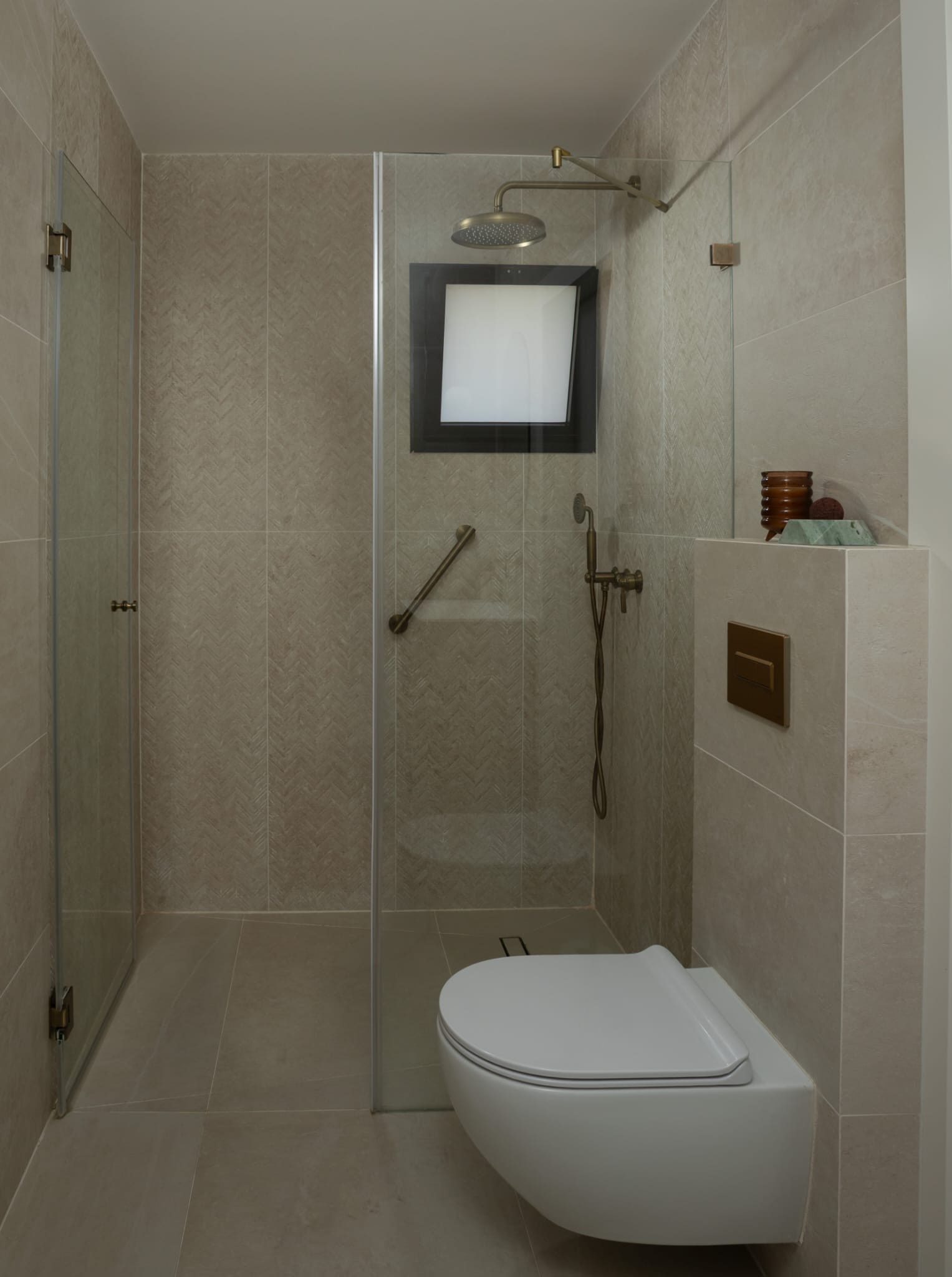 Elegant bathroom interior design in Bet Shemesh with shower and toilet
