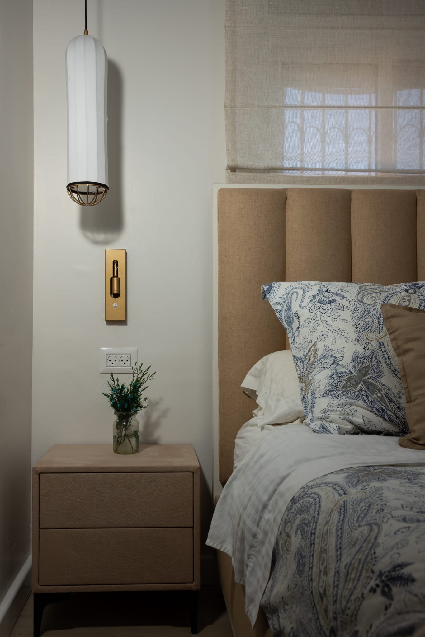 Bedroom detail with pendant light