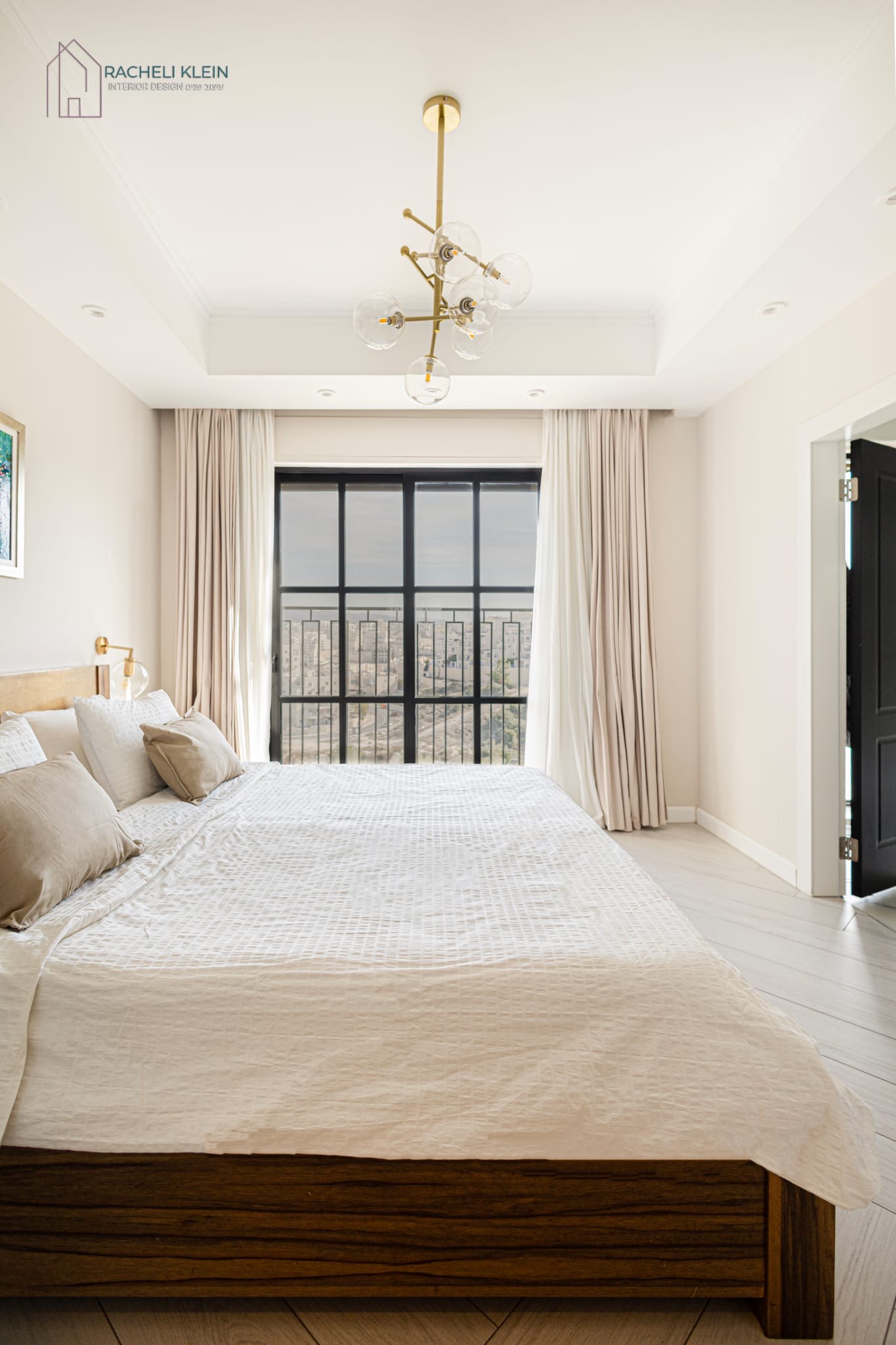 Minimalist bedroom with built-in wardrobe and light tones