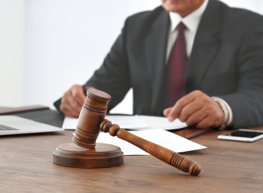 Legal professional reviewing bond conditions and court paperwork