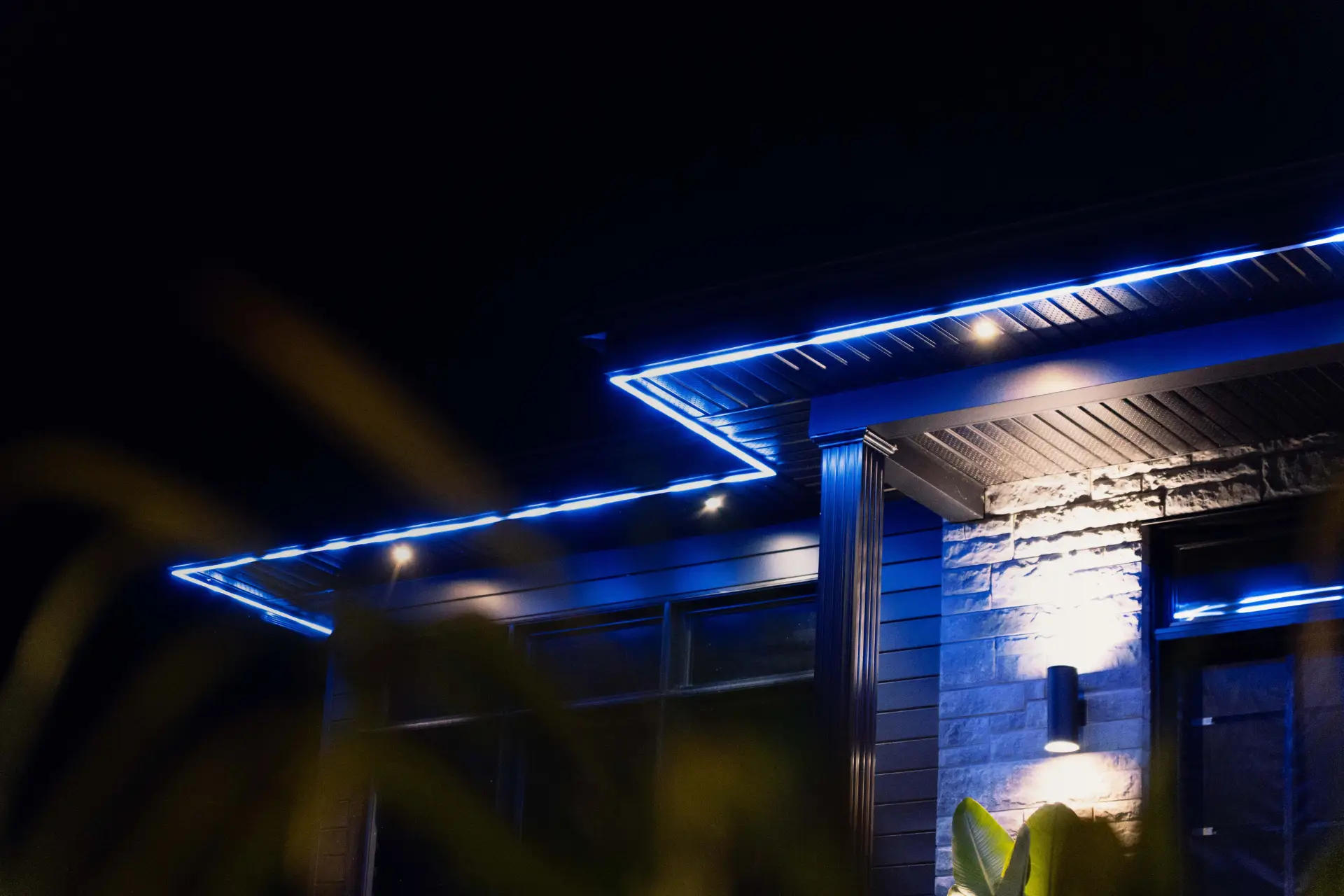 Vibrant multicolored permanent holiday roofline lighting