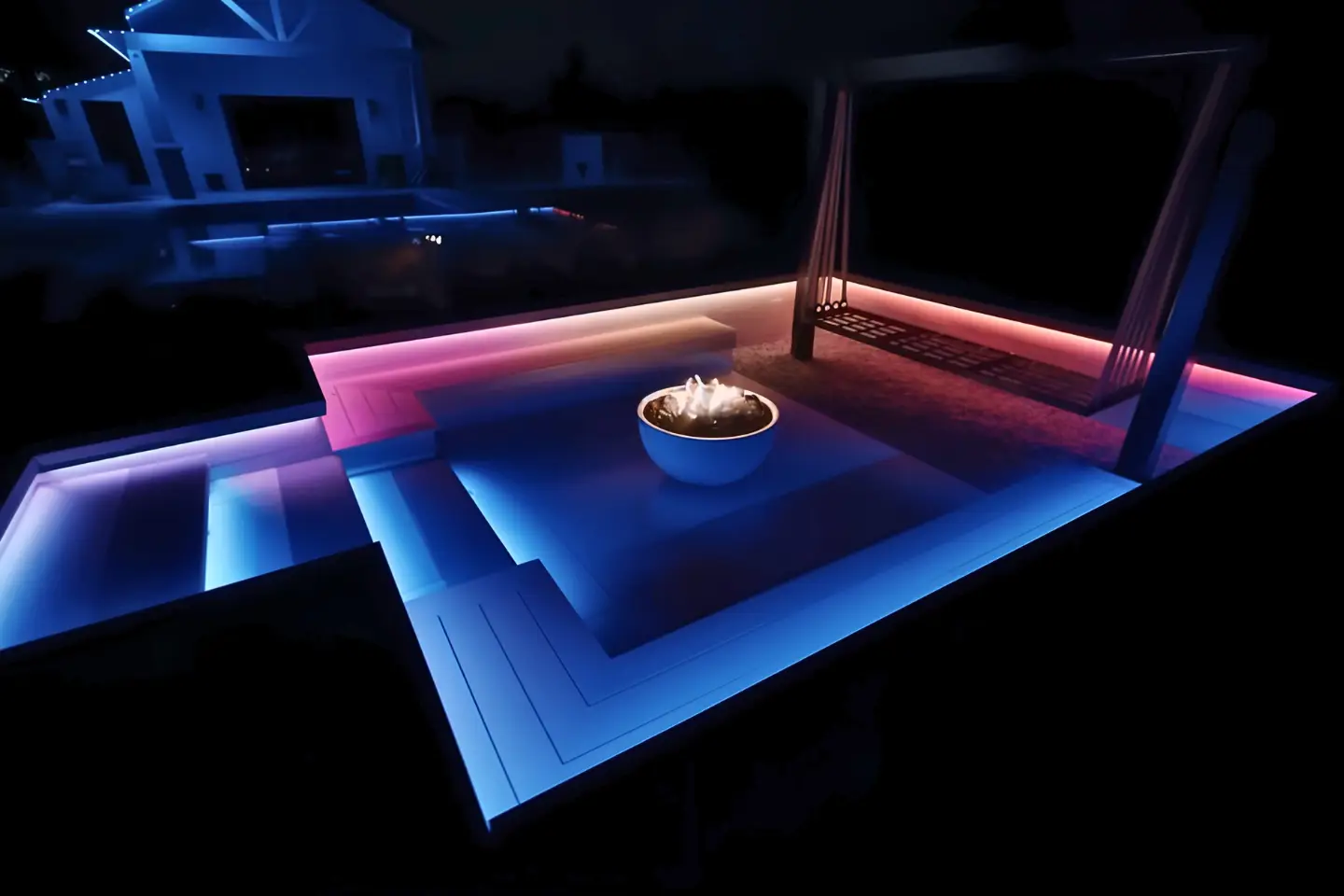 Suburban home glowing with permanent LED roofline lighting