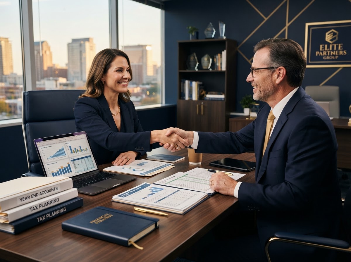 Business owner shaking hands with a professional accountant over organized financial documents