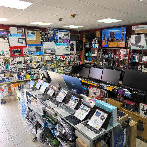 Store interior showing monitors and laptops