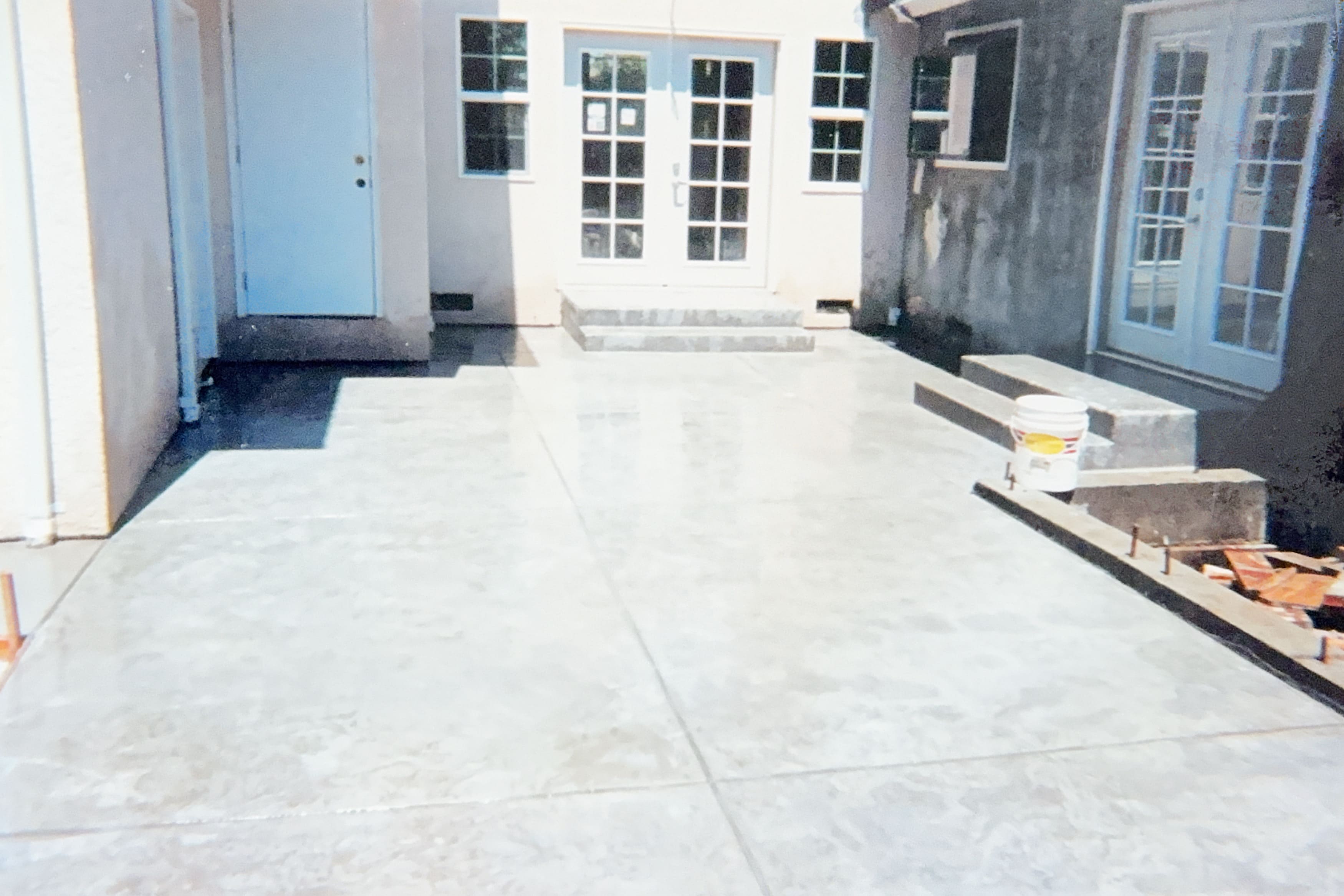 Spacious backyard concrete patio installation