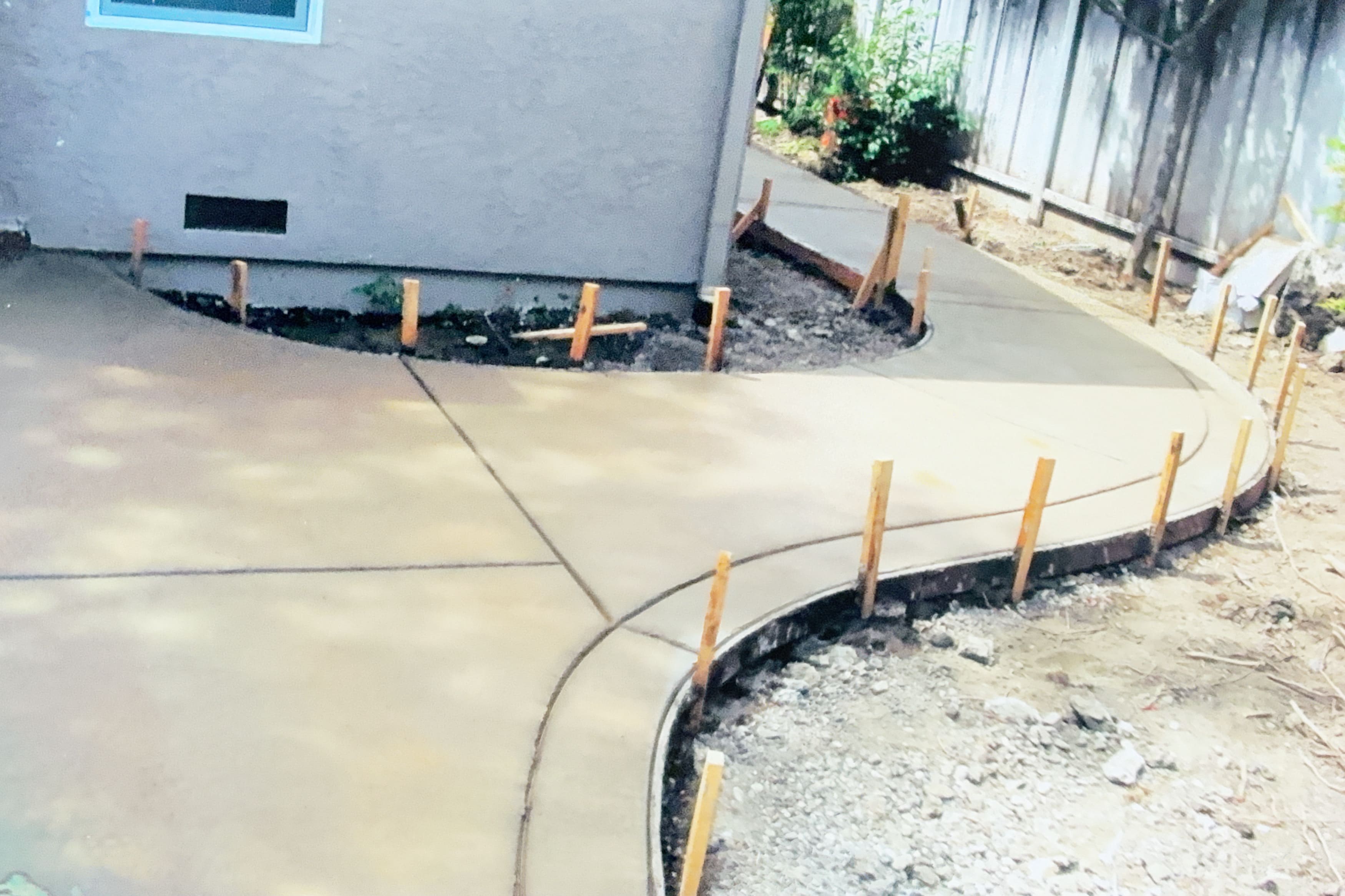 Concrete pathway preparation with wooden forms