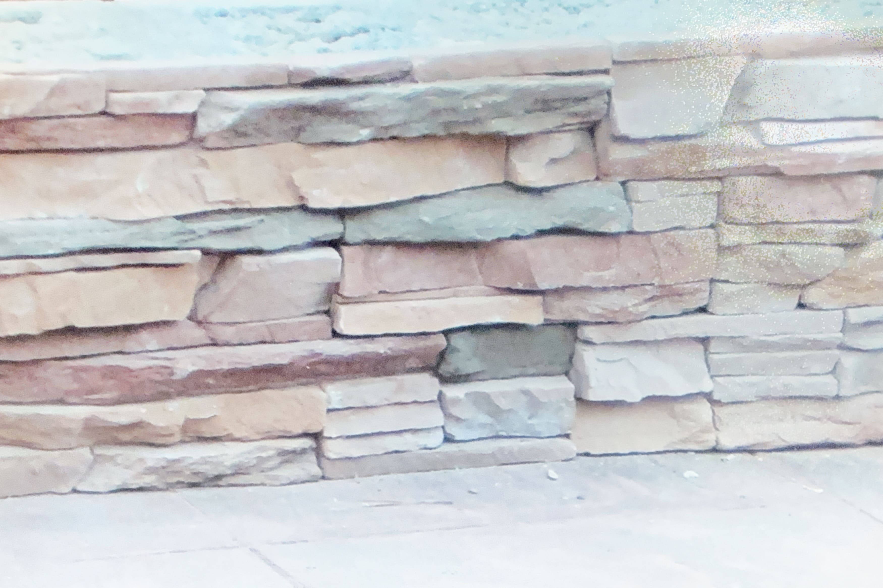Close-up detail of a custom stone veneer wall