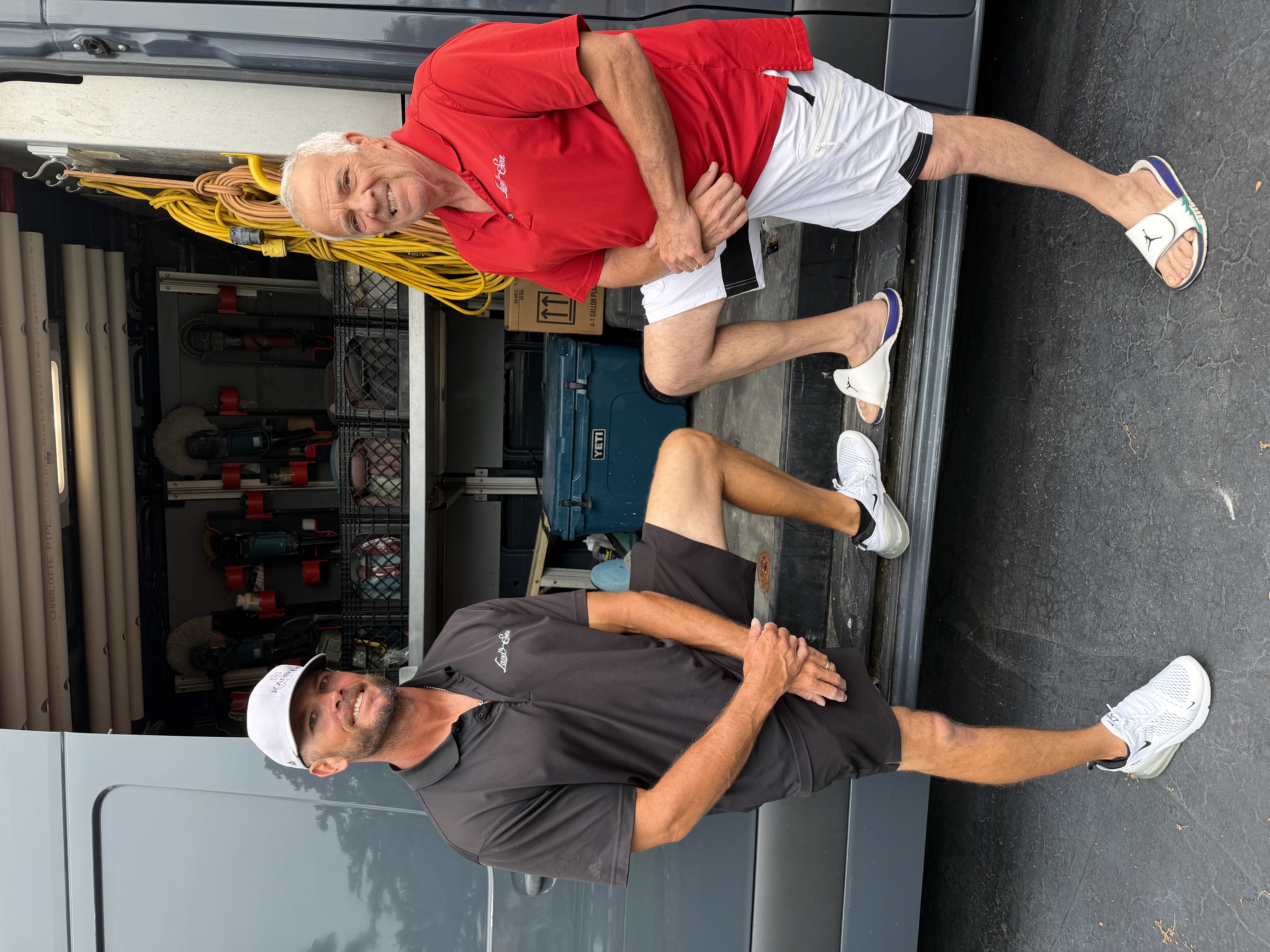 Jason Rockwood and Richard Noto, owners of Land and Sea Detailing Inc, in front of their fully equipped detailing van.