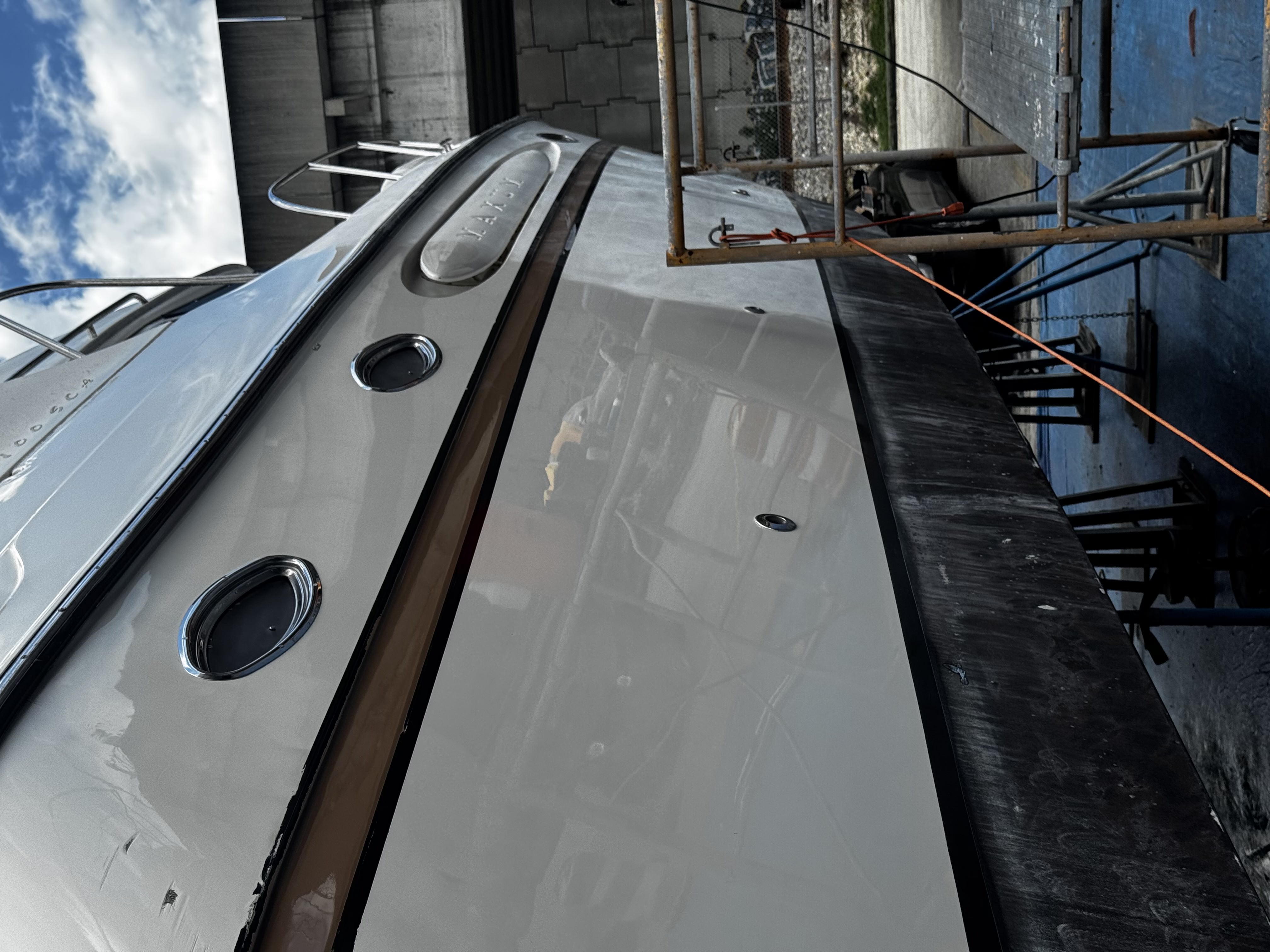 Same 52ft Maxum after second step -- Meguiars Pure Wax applied