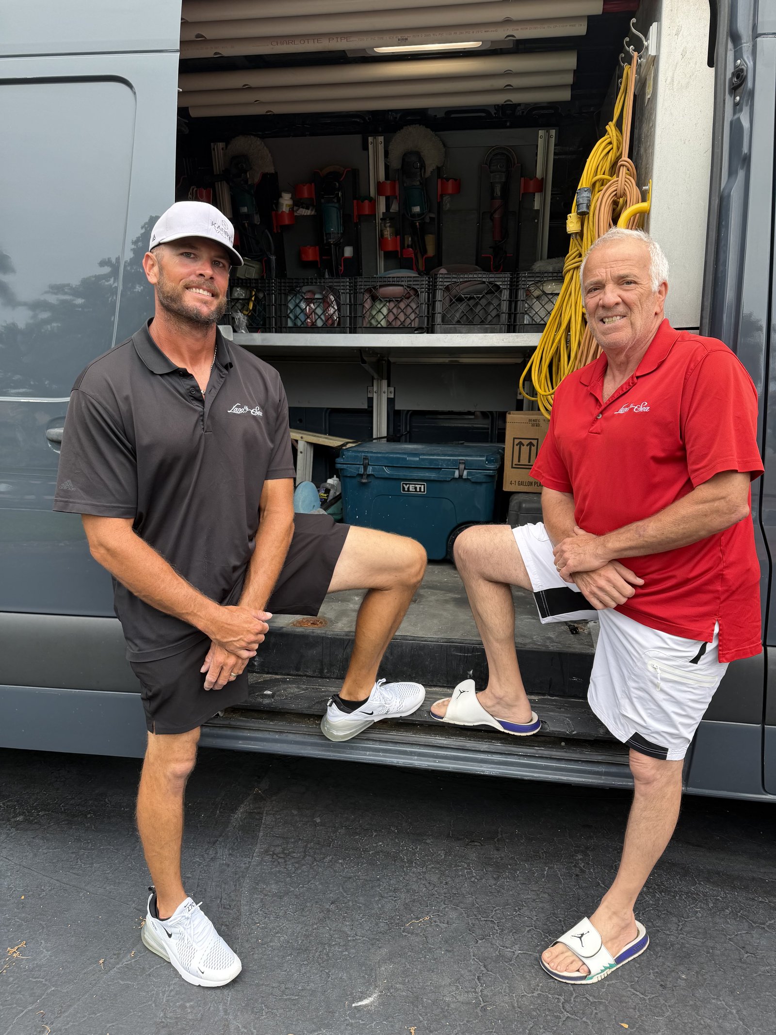 Jason Rockwood and Richard Noto, owners of Land and Sea Detailing Inc, in front of their fully equipped detailing van.