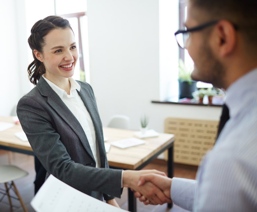 Agent and client shaking hands