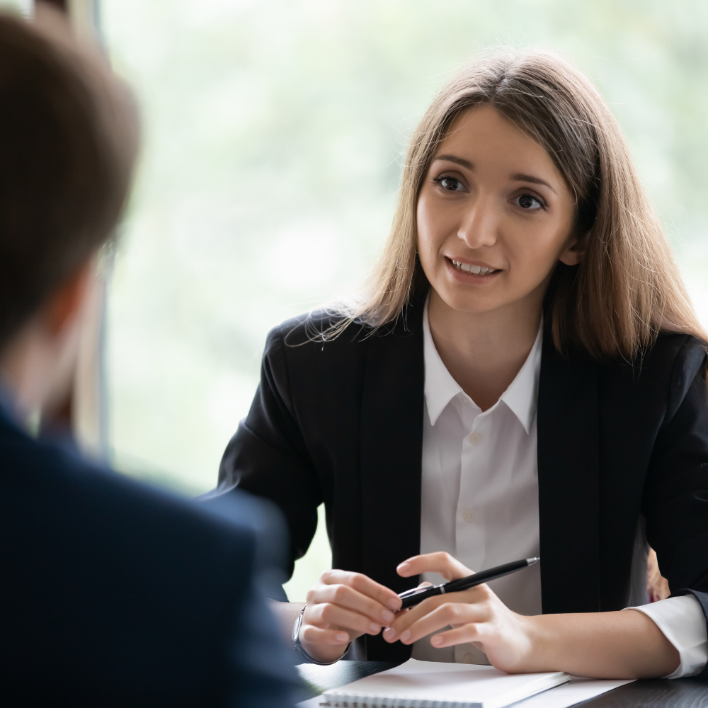 HR professional meeting with an employee