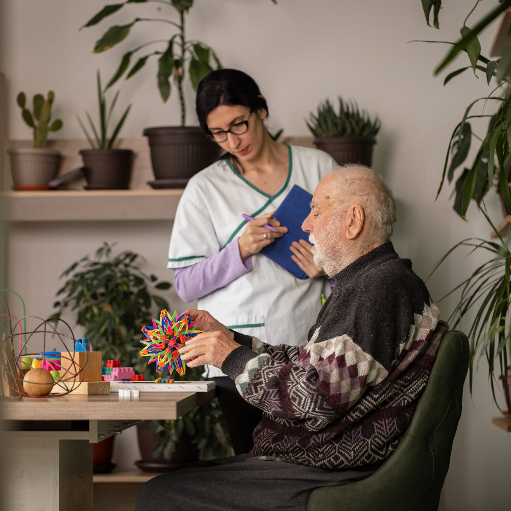 Care professional supporting an older adult at home