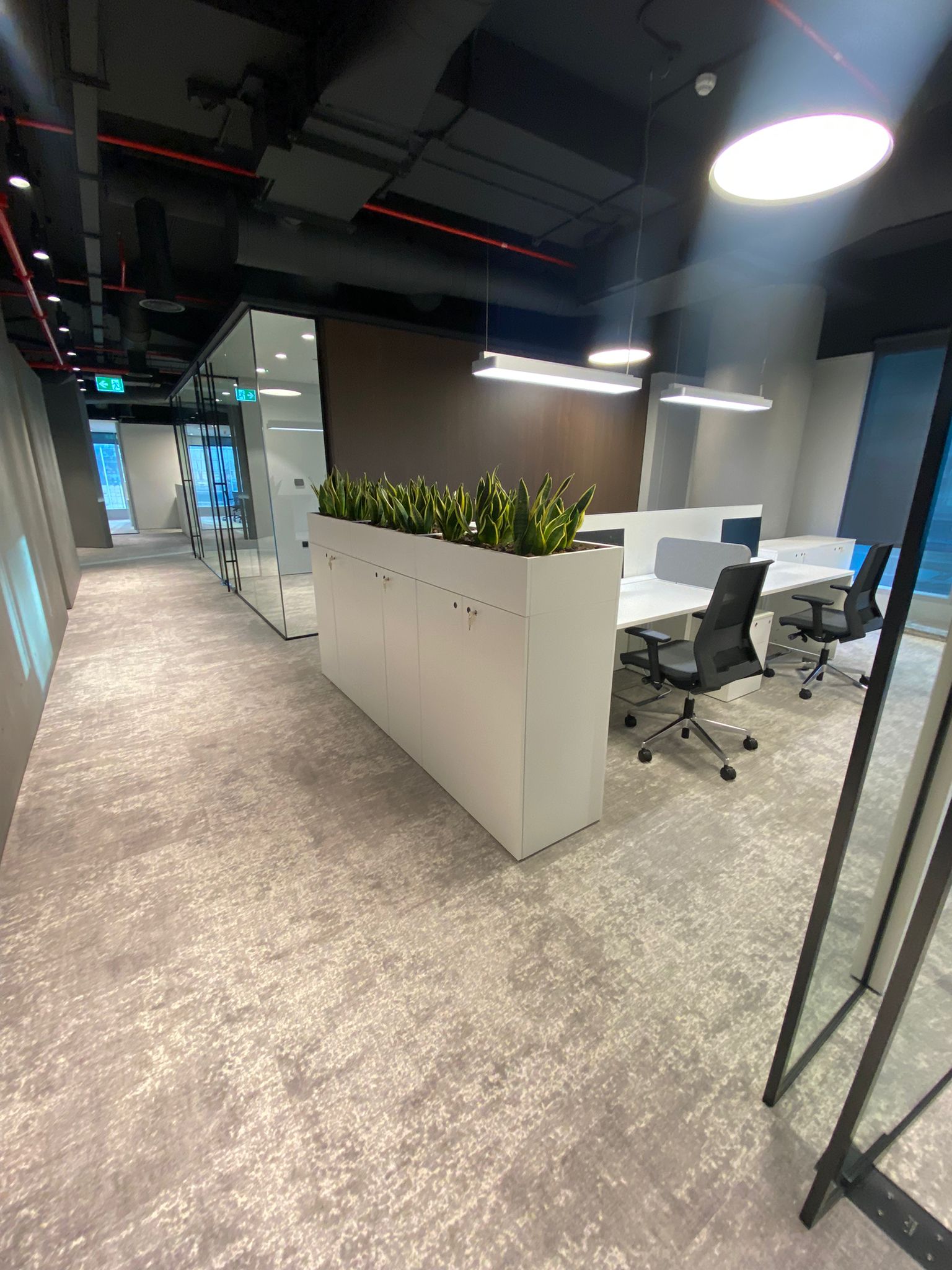 Al Khaleeji Bank carpet tile layout in office workspace