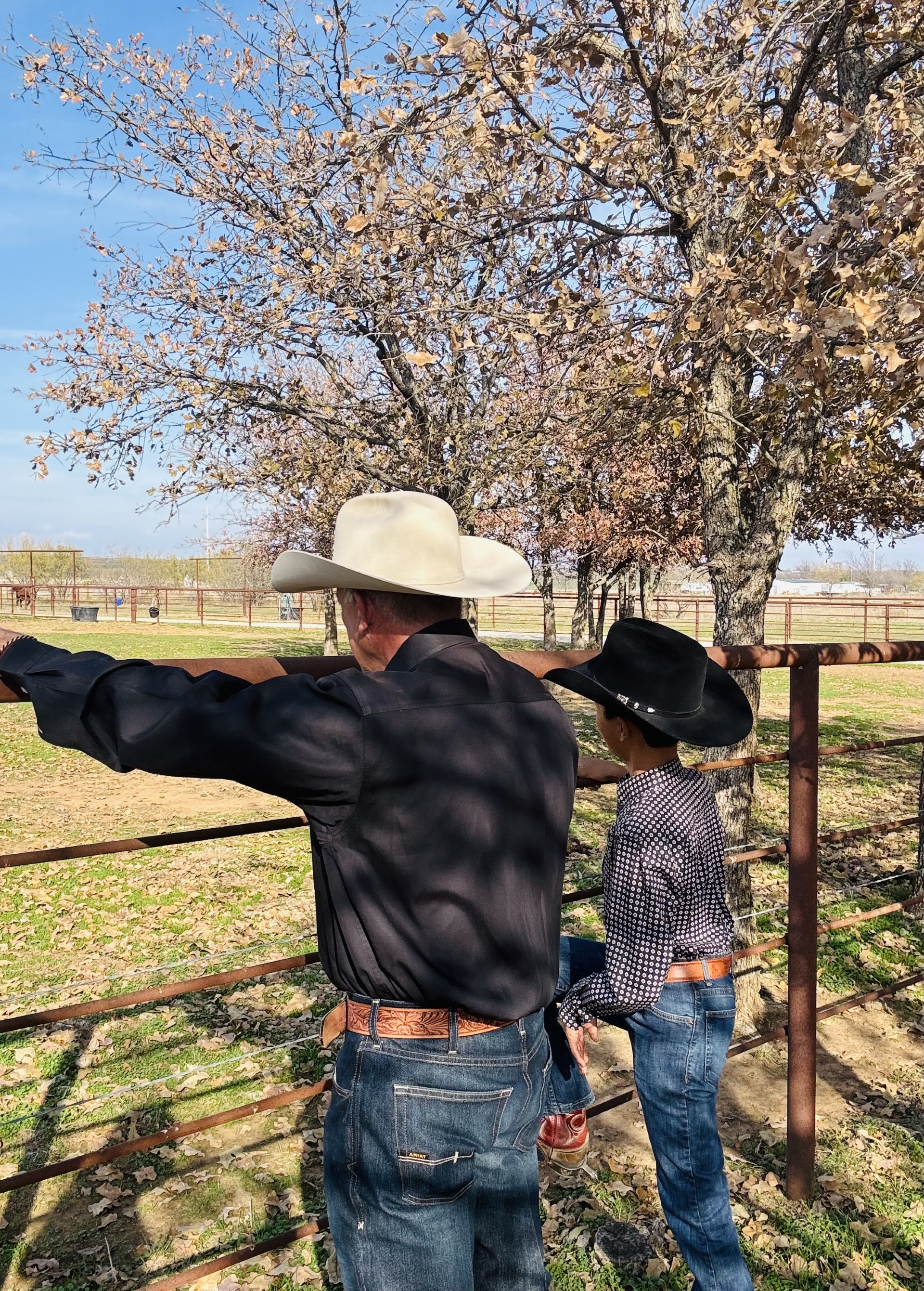 Rodney and our son at the fence