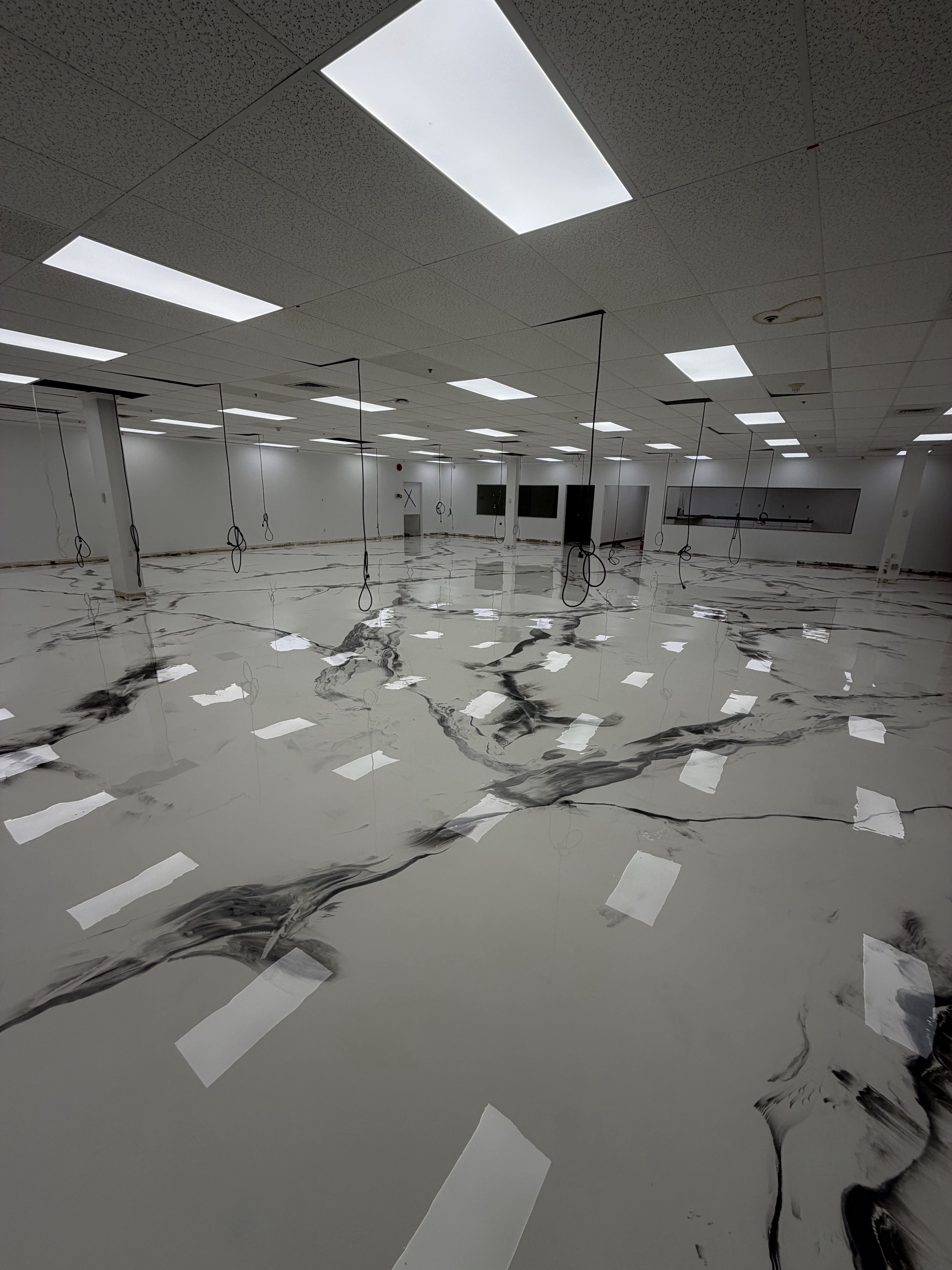 Marble-effect metallic epoxy commercial floor