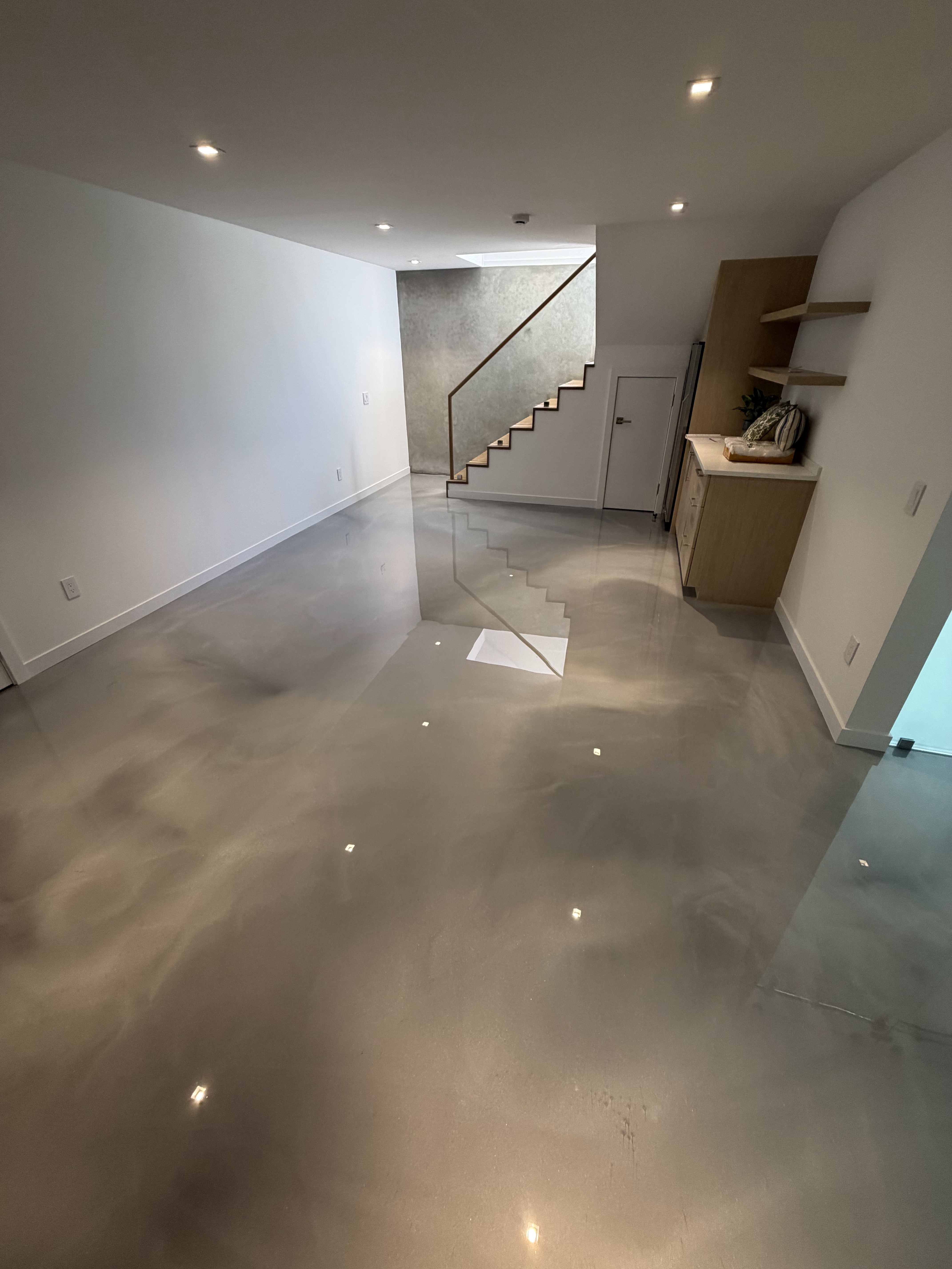 Residential living area with glossy metallic epoxy finish