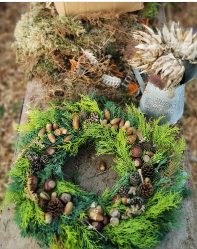 Handcrafted natural winter wreath created by artisan Zoe Verry