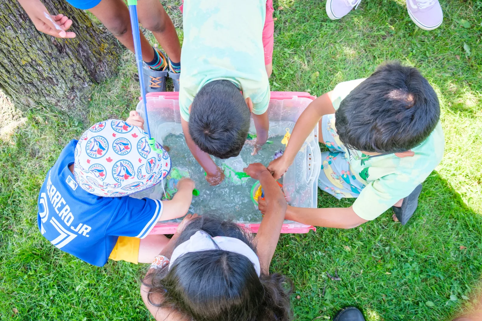 Kids exploring aquatic ecosystems at a BioTroopers science camp