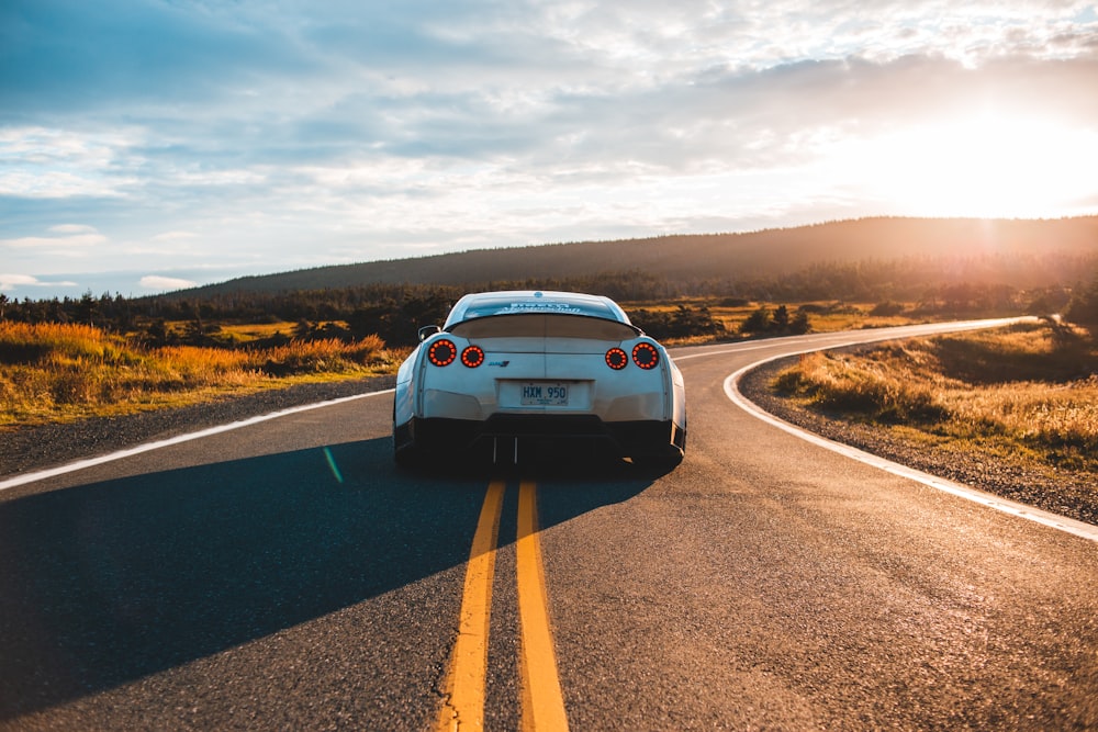 Car driving on a scenic road
