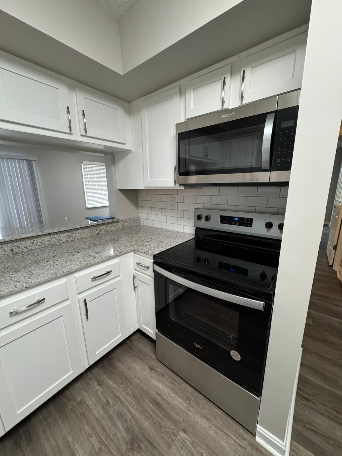 Kitchen remodel with new appliances by A Kingdom Construction Co.