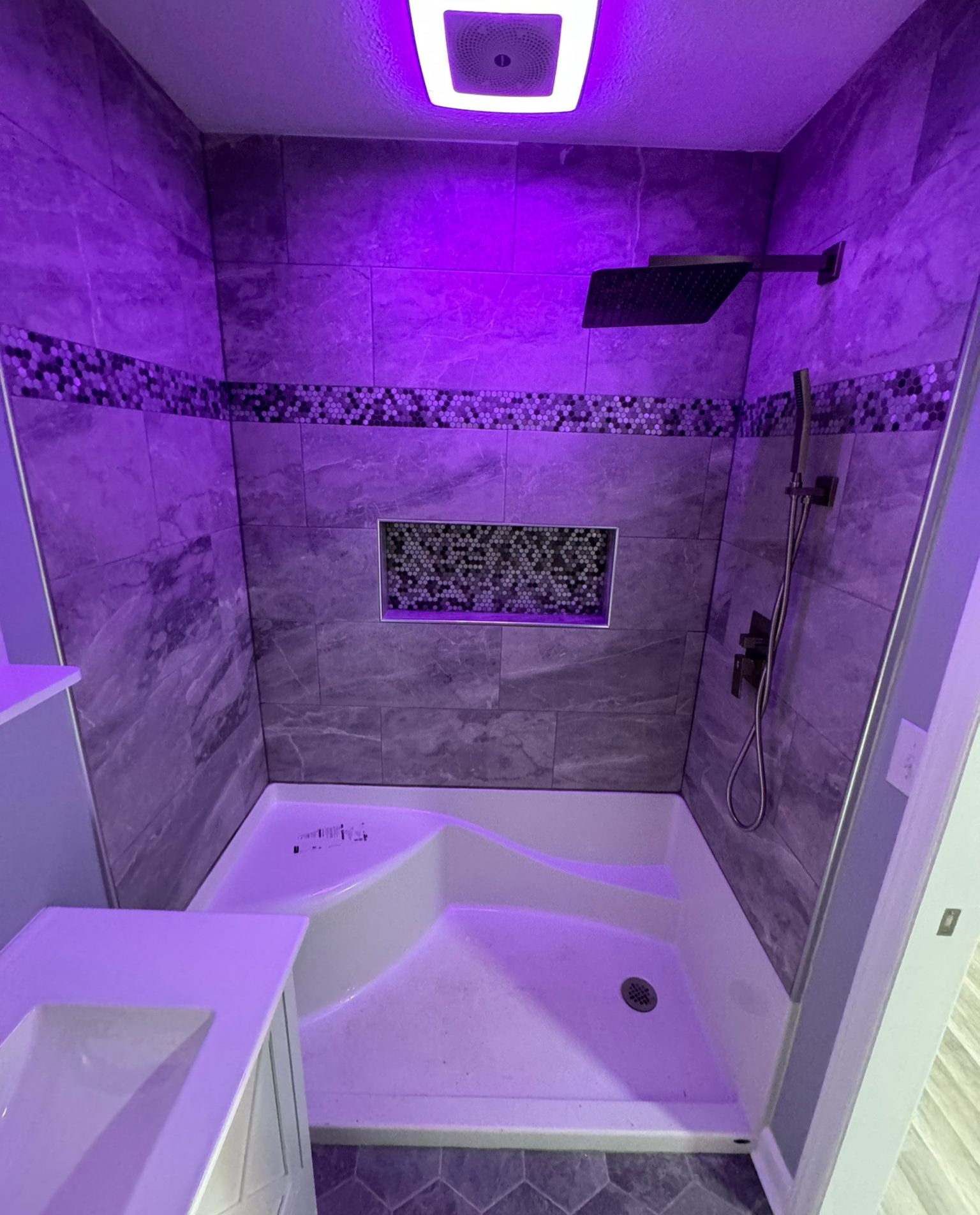 Bathroom remodel with vanity by A Kingdom Construction Co.