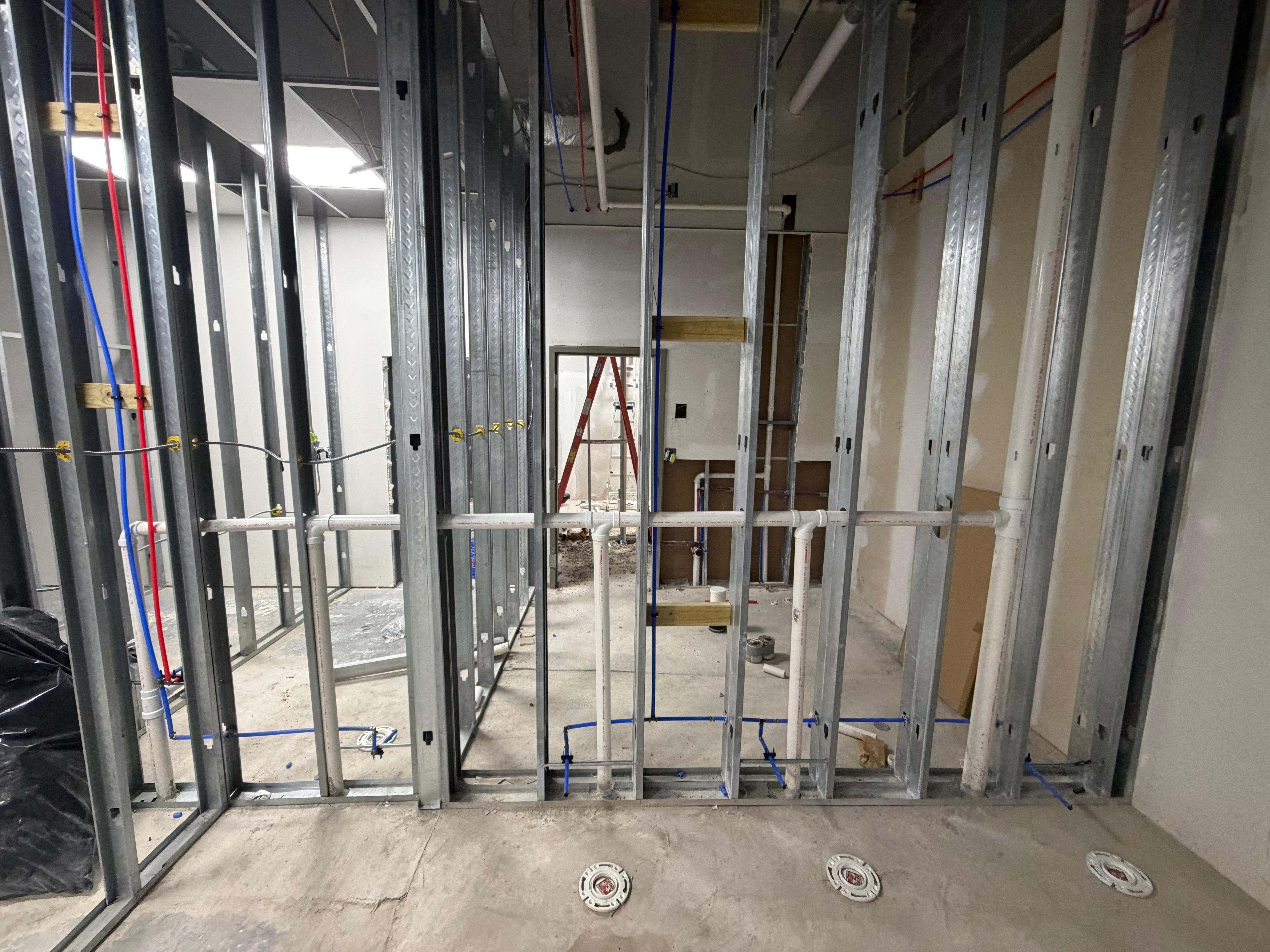 Bathroom plumbing rough-in by A Kingdom Construction Co.