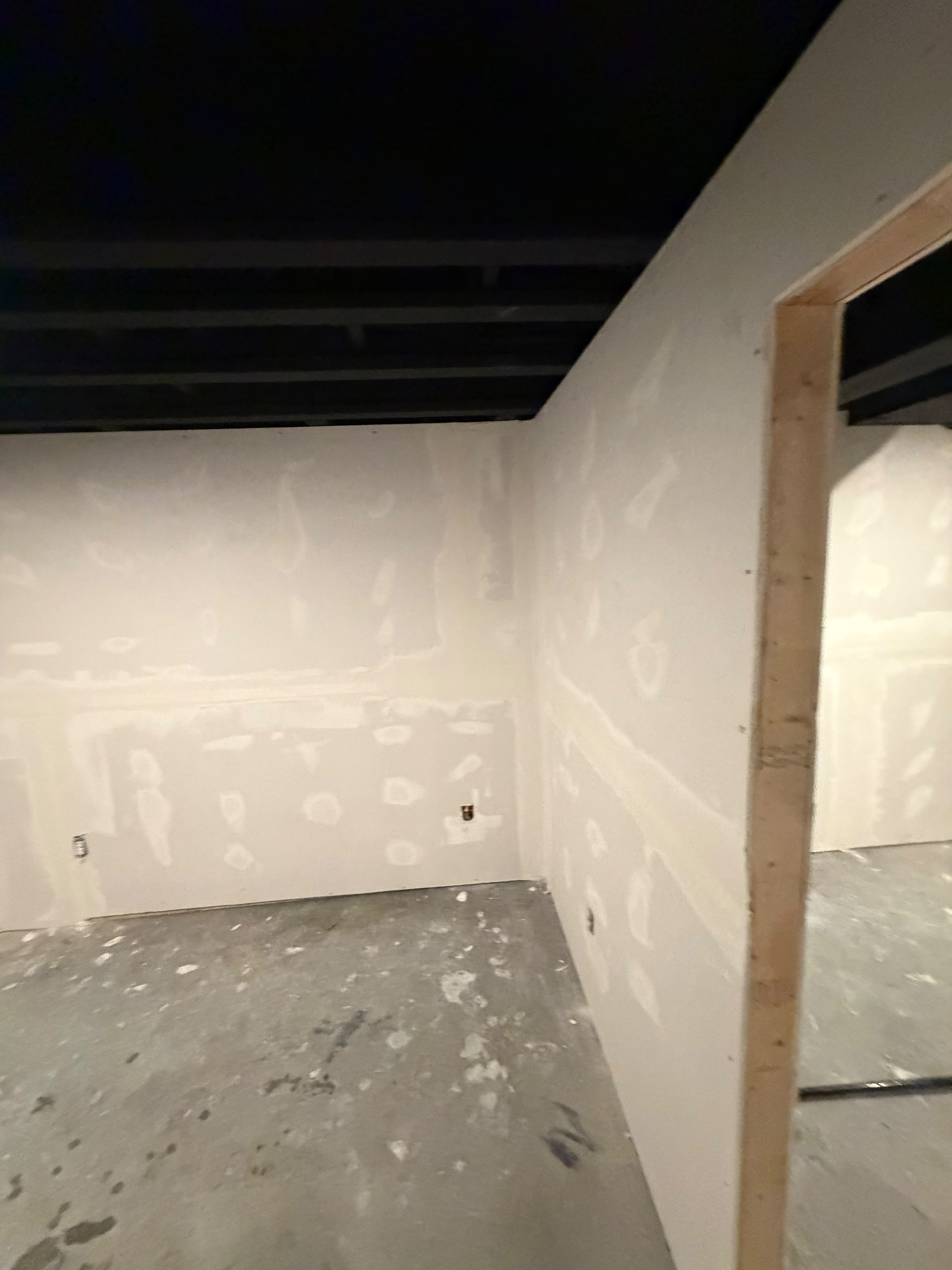Sheetrock installation with skim coat finish by A Kingdom Construction Co.
